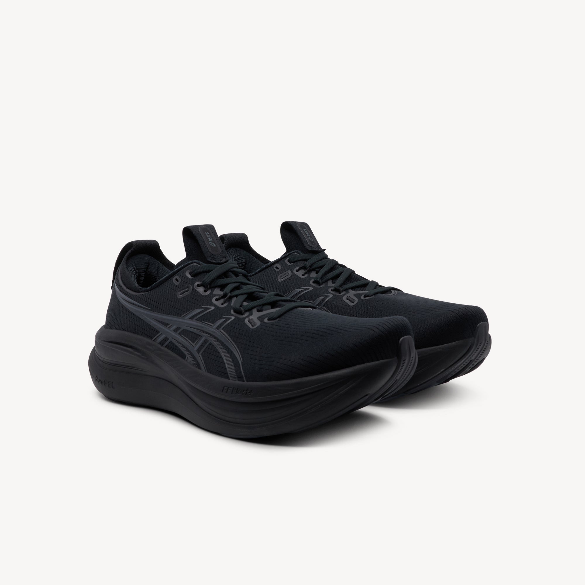 Side view of ASICS GEL-NIMBUS 28 features premium cushioning technology and plush comfort at Profeet Footwear. Purpose-built running shoe for men. Expert-fitted.