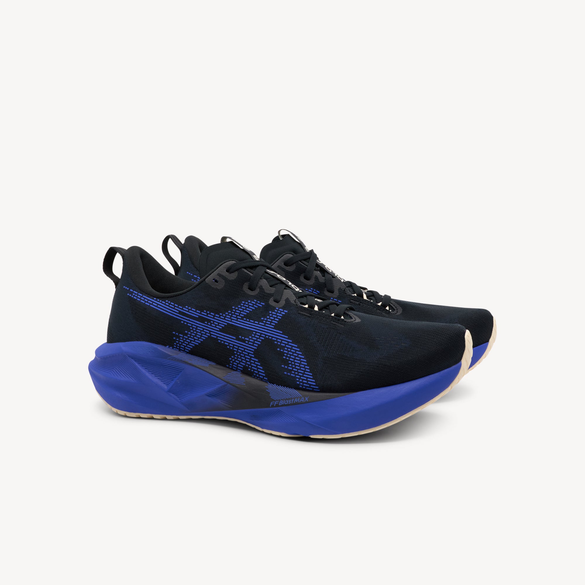 Side view of ASICS NOVABLAST 5 features energetic cushioning and responsive bounce at Profeet Footwear. Purpose-built running shoe for men. Expert-fitted.