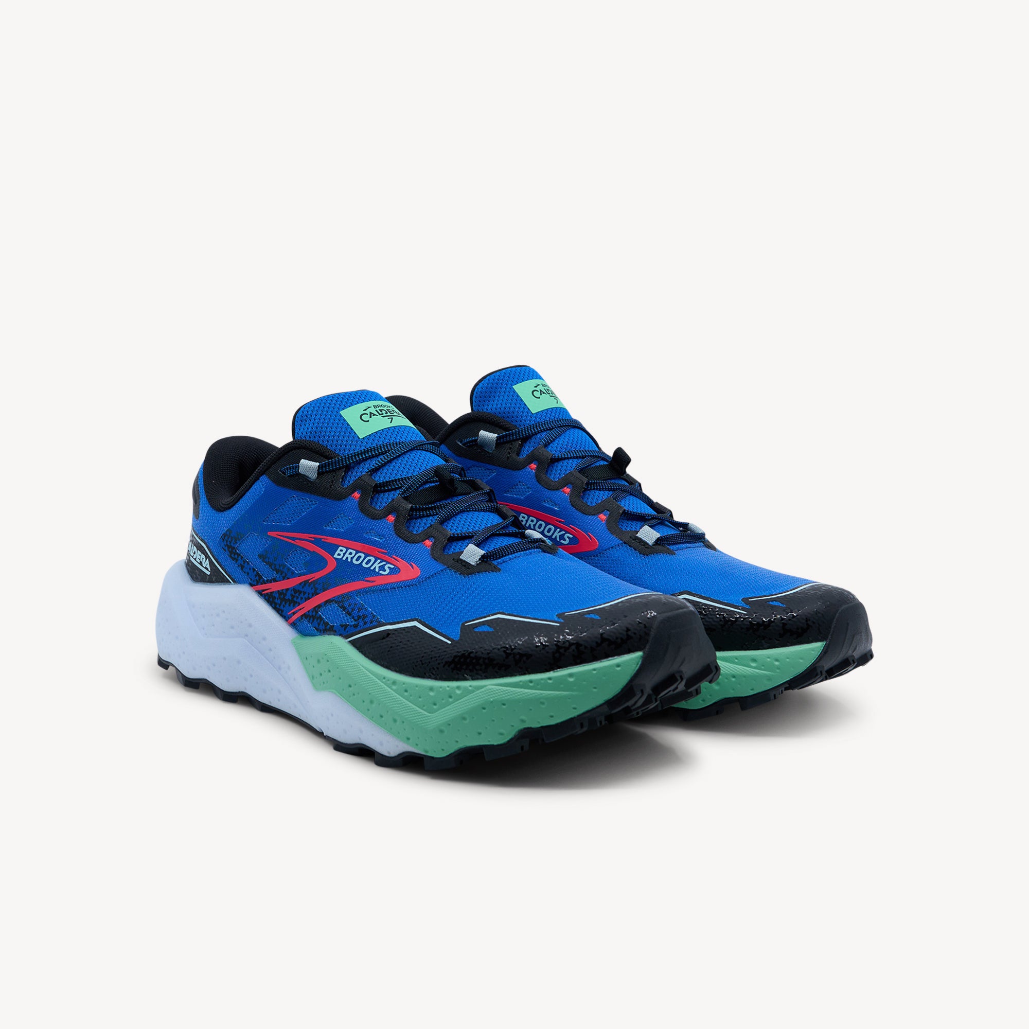 Side view of Brooks Caldera 7 features ultra-soft trail comfort at Profeet Footwear. Maximum cushioning with grippy traction for long-distance trail runs. Shop now.