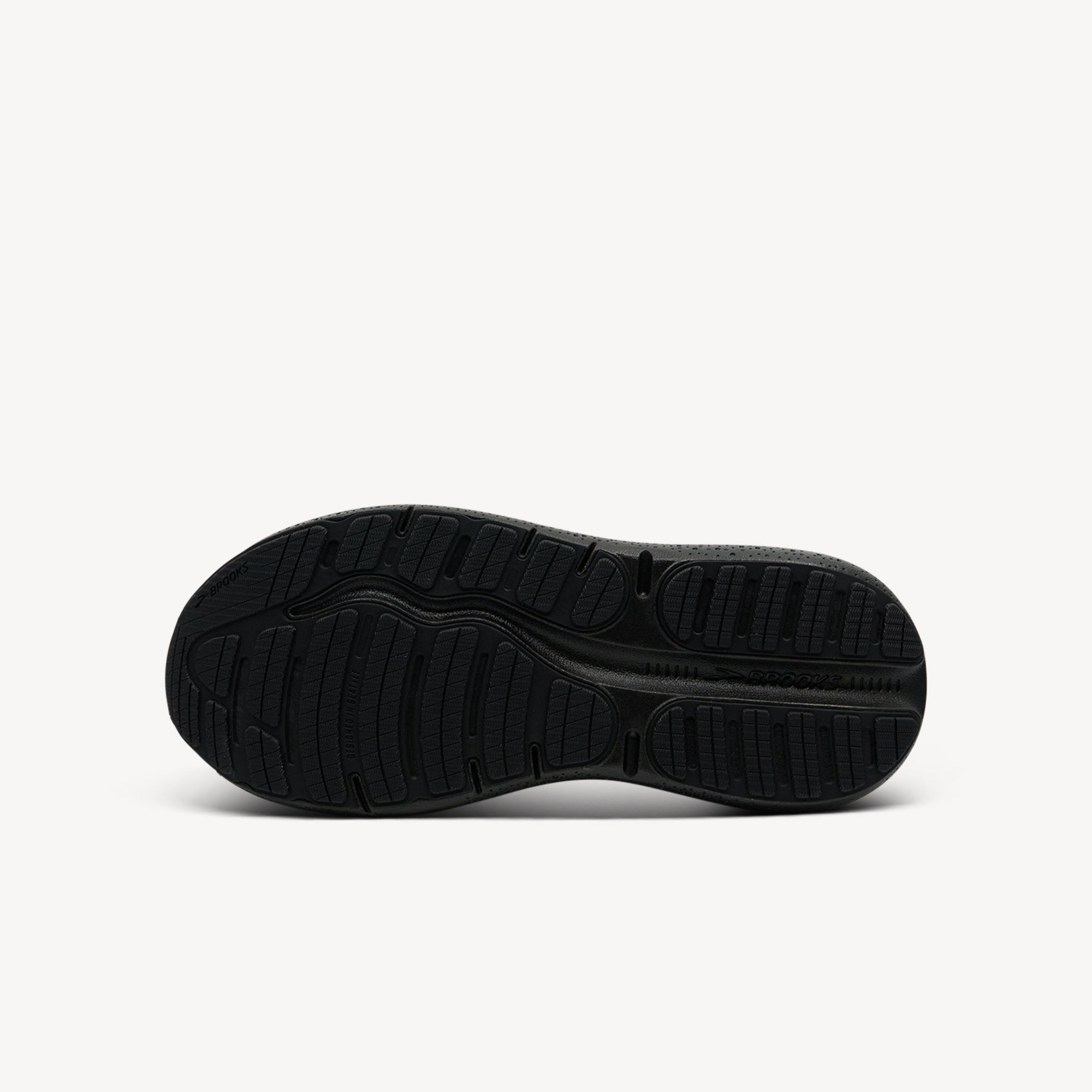 Outsole view of Brooks Ghost Max 2 features maximum cushioning at Profeet Footwear. GlideRoll Rocker technology for smooth protective transitions mile after mile.