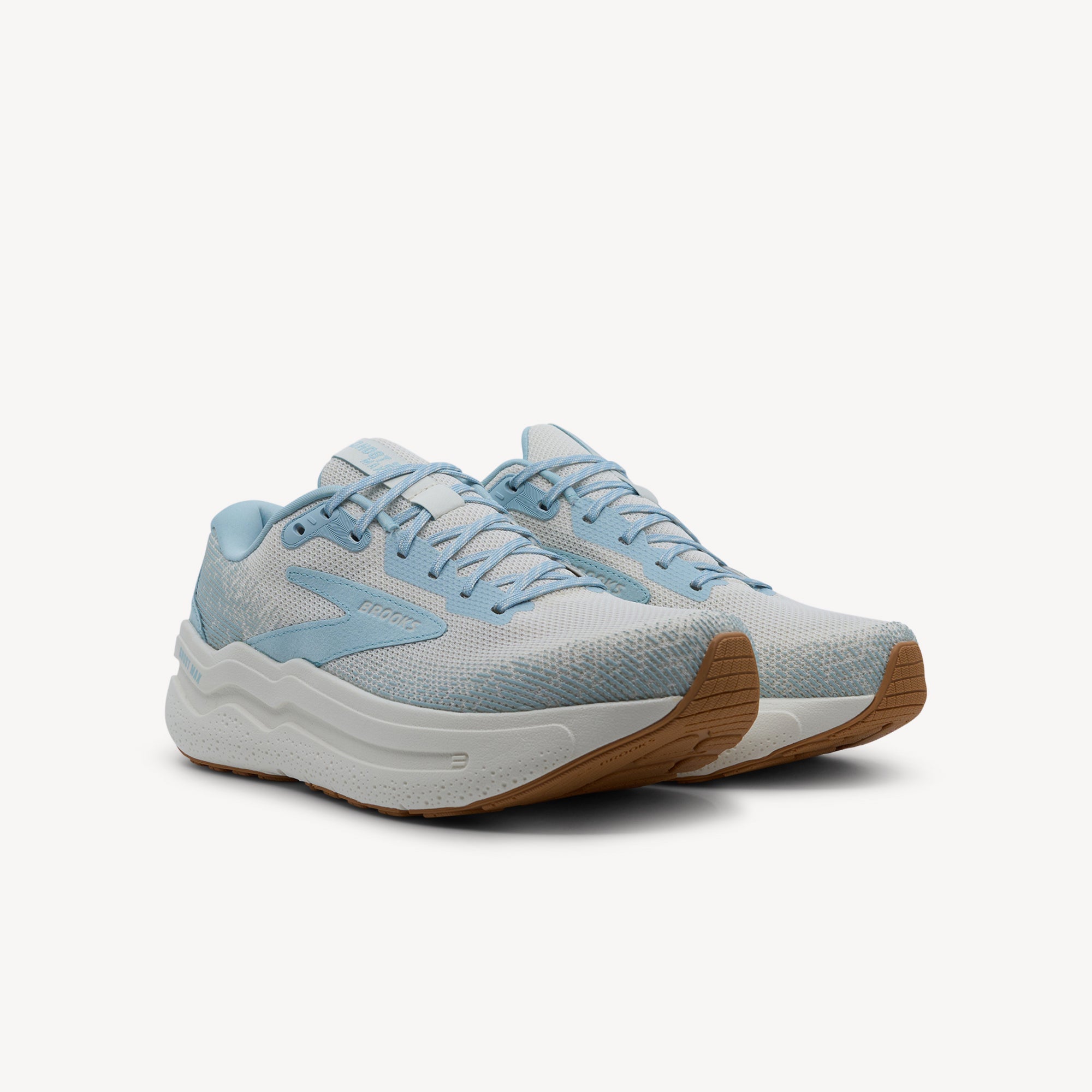 Side view of Brooks Ghost Max 2 features maximum cushioning at Profeet Footwear. GlideRoll Rocker technology for smooth protective transitions mile after mile.