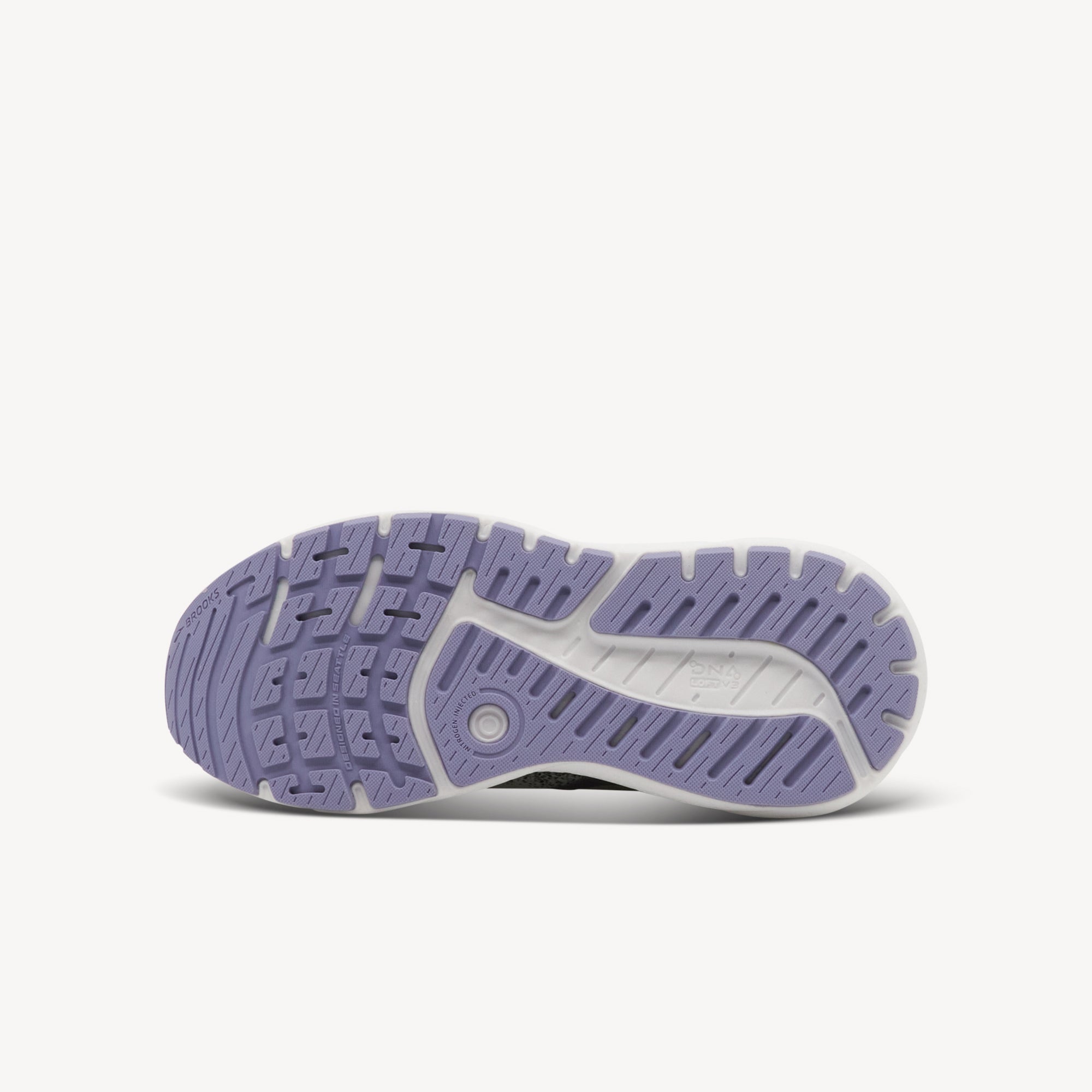 Outsole view of Brooks Ariel GTS 24 features maximum stability at Profeet Footwear. DNA Loft v3 cushioning for secure supportive comfort controlling excess movement.