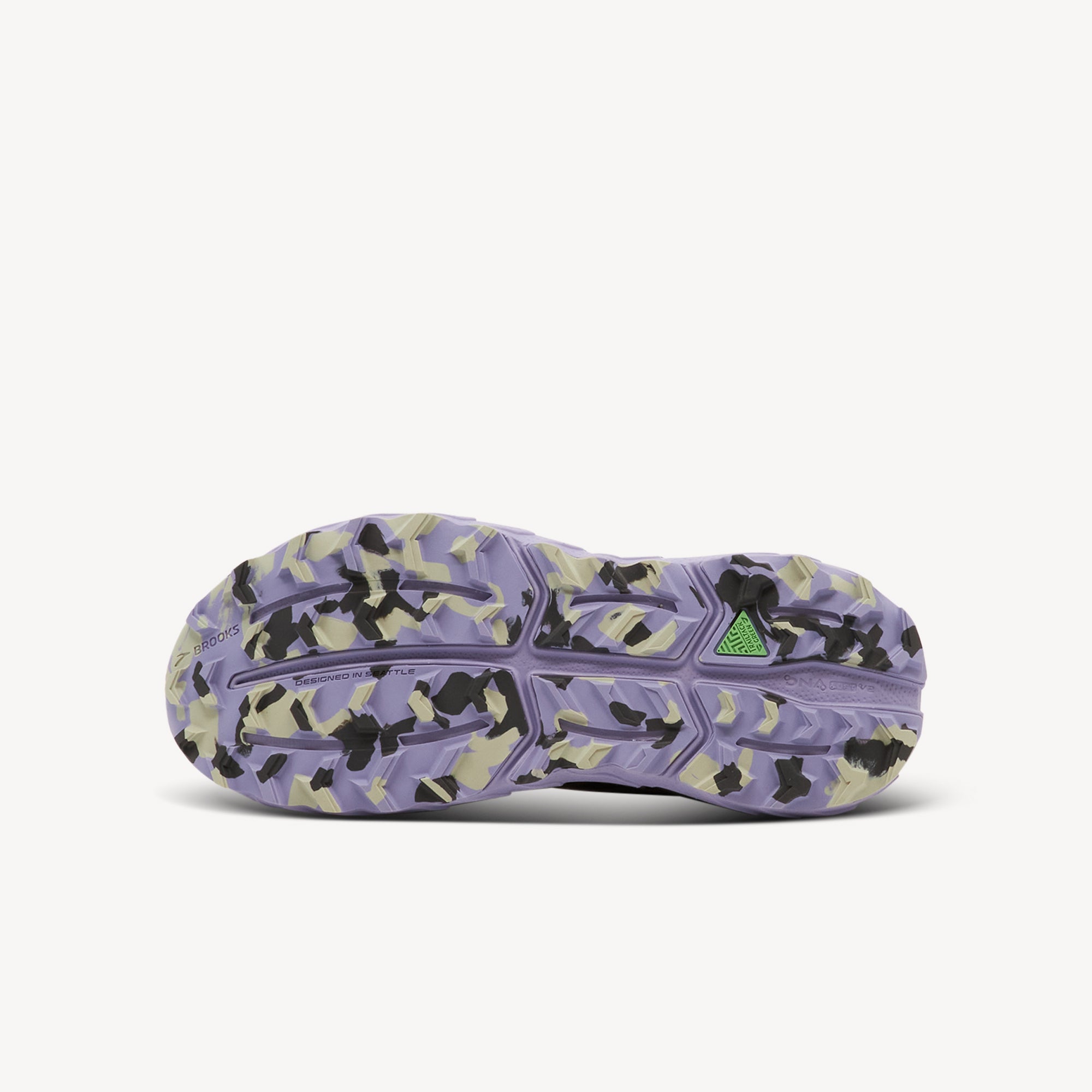 Outsole view of Brooks Cascadia 18. TrailTack Green Rubber Outsole features sticky grippy rubber with 3.4-4.5mm deep aggressive lugs. Shop now at Profeet Footwear.