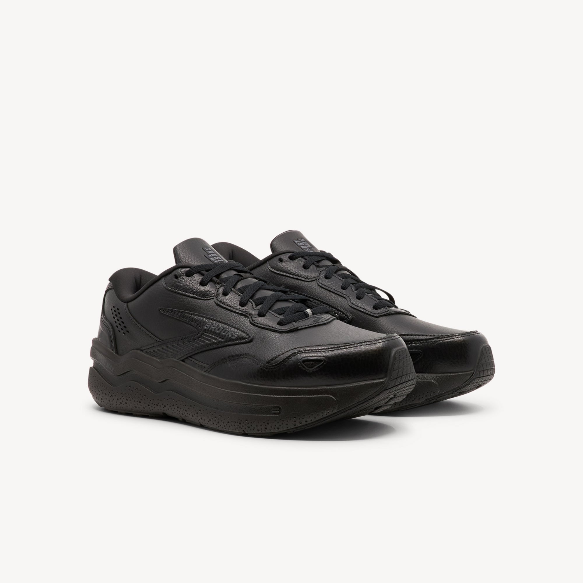 Side view of Brooks Ghost Max 2 Leather features easy-clean style at Profeet Footwear. Maximum cushioning with GlideRoll Rocker for effortless smooth transitions.