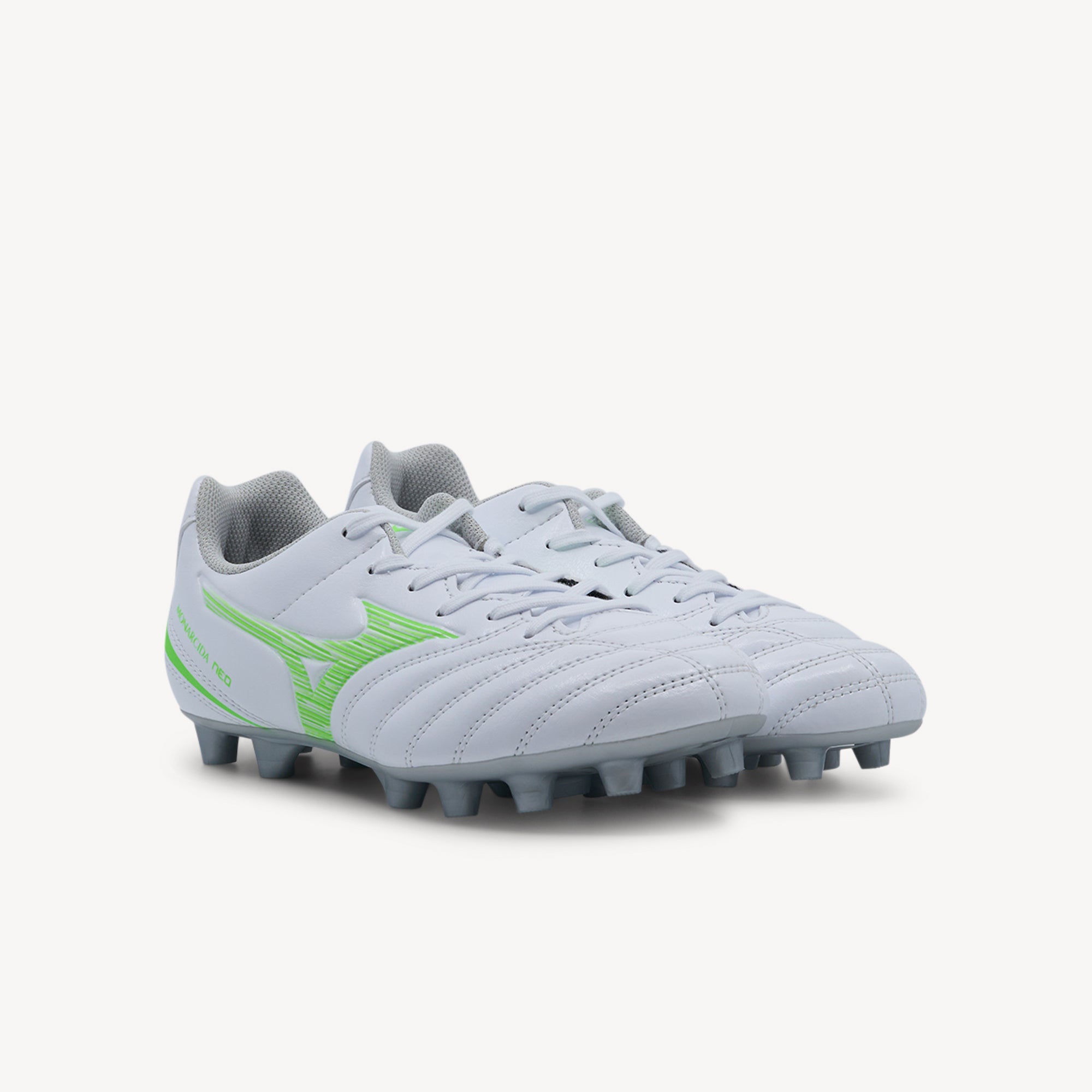 Side view of Mizuno Monarcida Neo III Select Junior FG features soft synthetic upper at Profeet Footwear. Comfortable junior football boot for all young players.