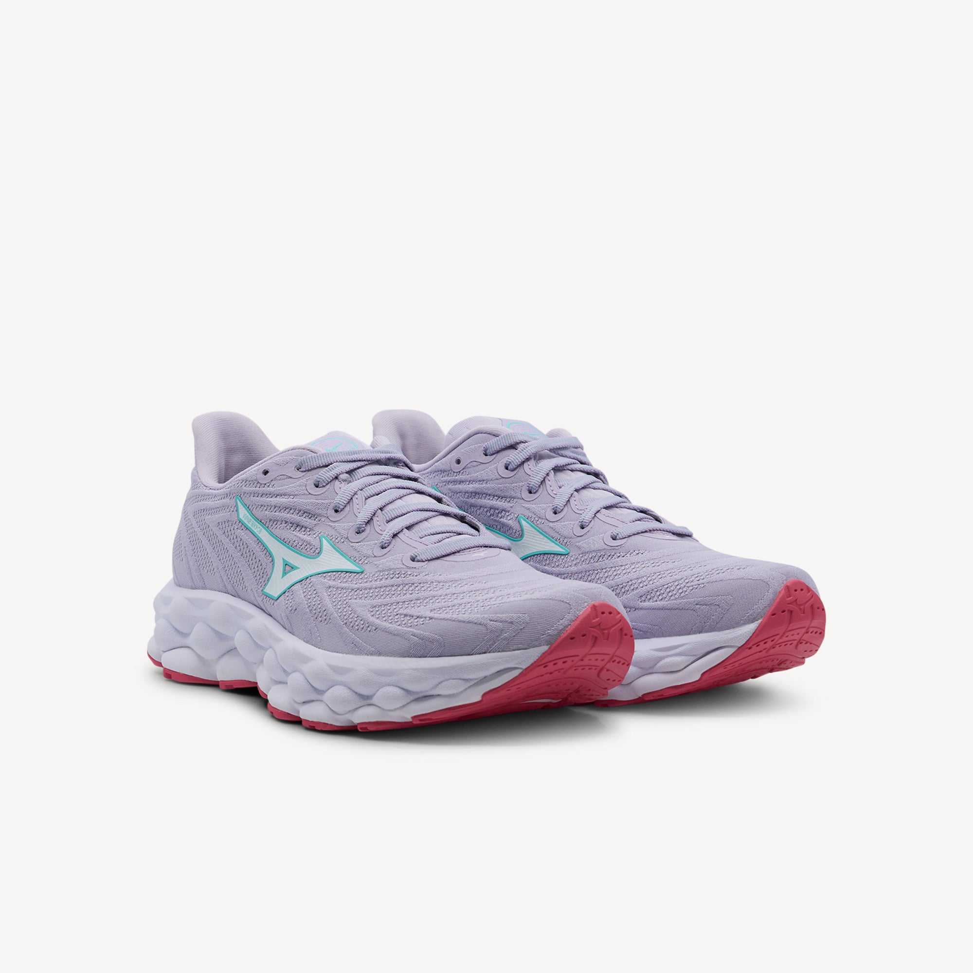 Side view of Mizuno Wave Sky 8 features Foam Wave cushioning at Profeet Footwear. Women's neutral running shoe for soft, responsive daily training and comfort.
