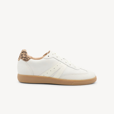 Frankie4 Levi features triple-layer support & leopard print at Profeet Footwear. Classic white sneaker with podiatrist-designed comfort & retro gum sole.