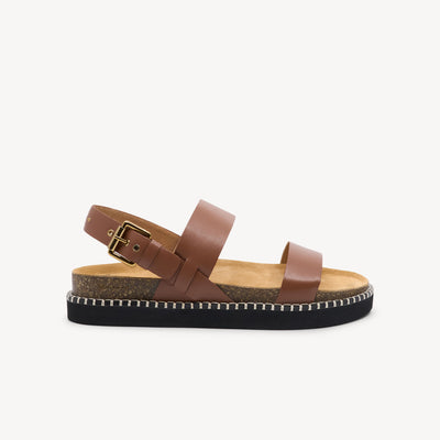 Frankie4 Hunter Rich Tan sandals feature dual-layer support system & eco-friendly EVA sole at Profeet Footwear. Premium leather with podiatrist-backed comfort.