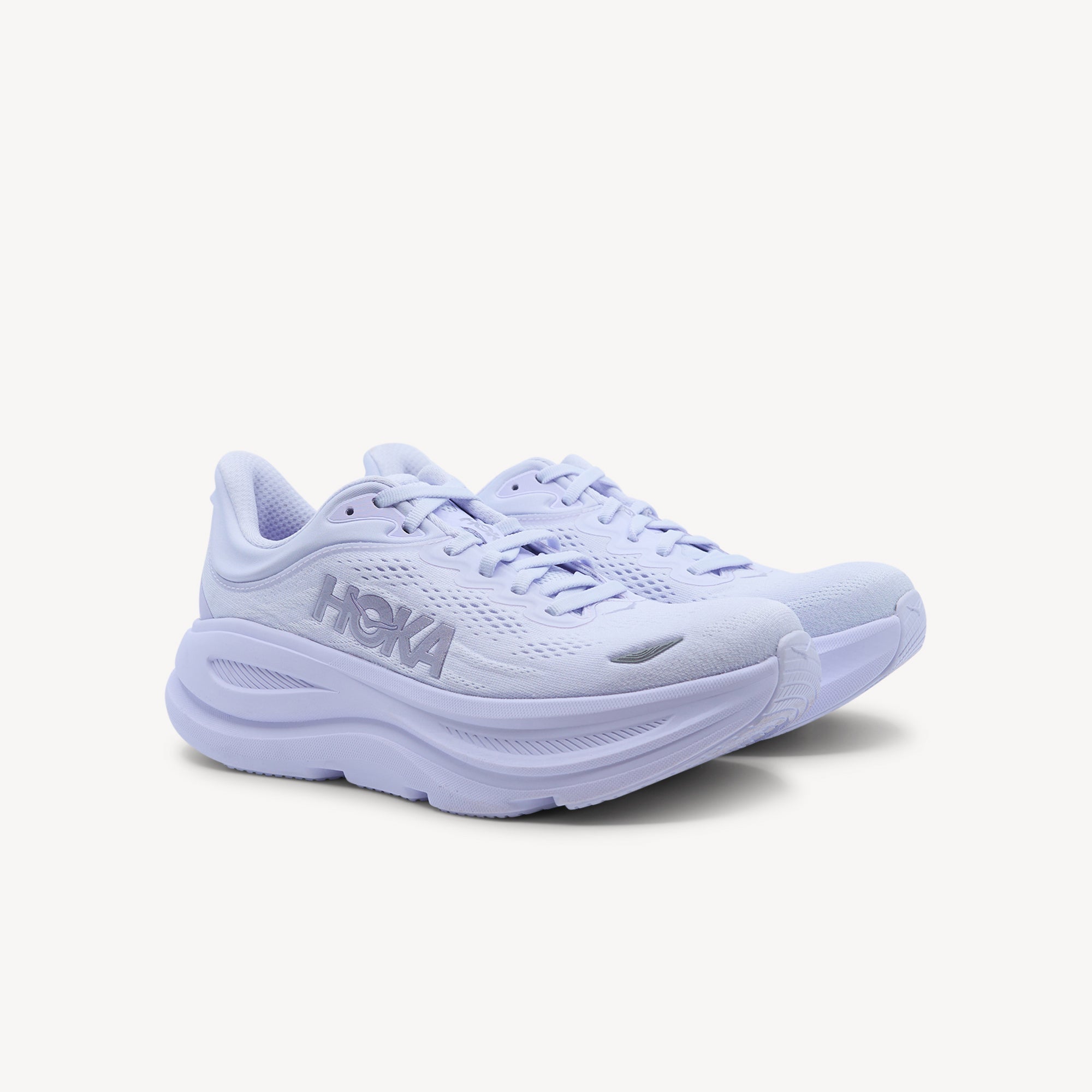 Side view of Hoka Bondi 9 features max cushioning at Profeet Footwear. Plush neutral trainer with extended heel geometry for all-day comfort. Shop now.