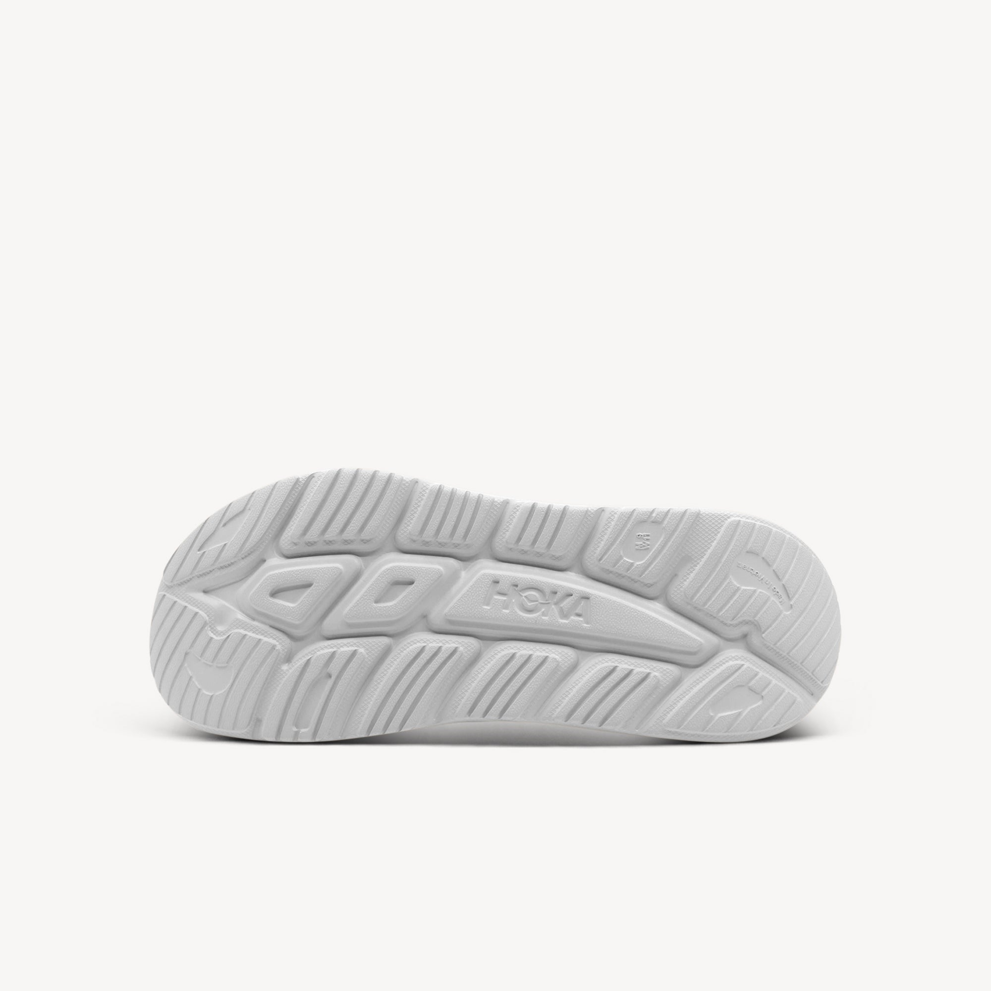 Outsole view of Hoka Ora Recovery Slide 3 features plush cushioning at Profeet Footwear. Oversized midsole recovery slide for all-day relaxation and comfort. Shop now.