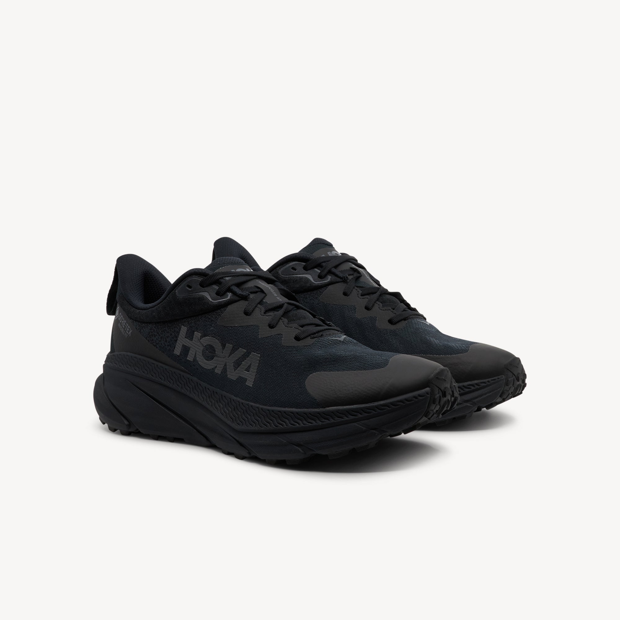 Side view of Hoka Challenger ATR 7 GTX features all-terrain versatility at Profeet Footwear. GORE-TEX protection with responsive cushioning for any surface. Shop now.