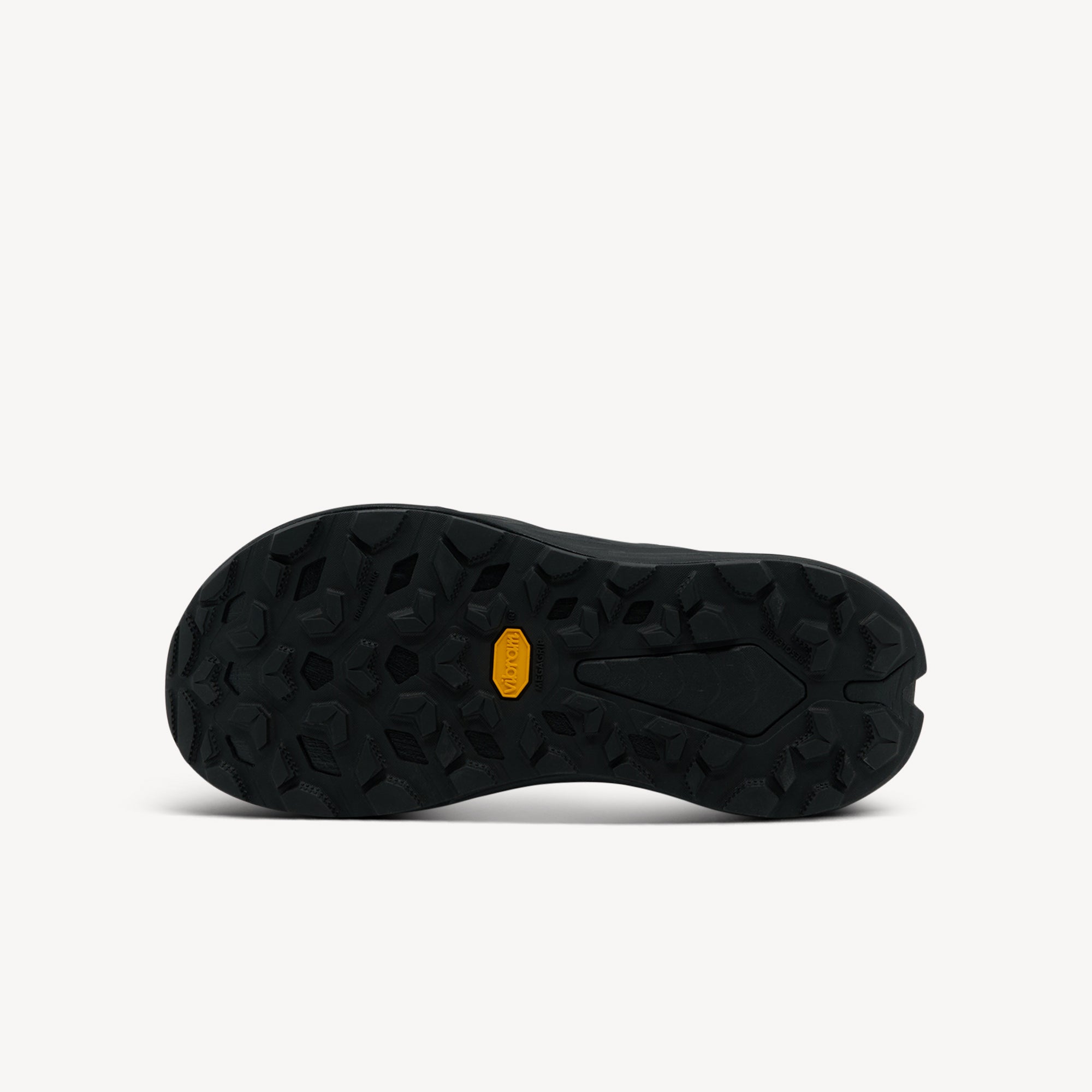 Outsole view of Hoka Inifinti Hike. Vibram Megagrip Outsole incorporates one-piece rubber construction with Traction Lug technology and 3.5mm lugs. Shop now at Profeet Footwear.