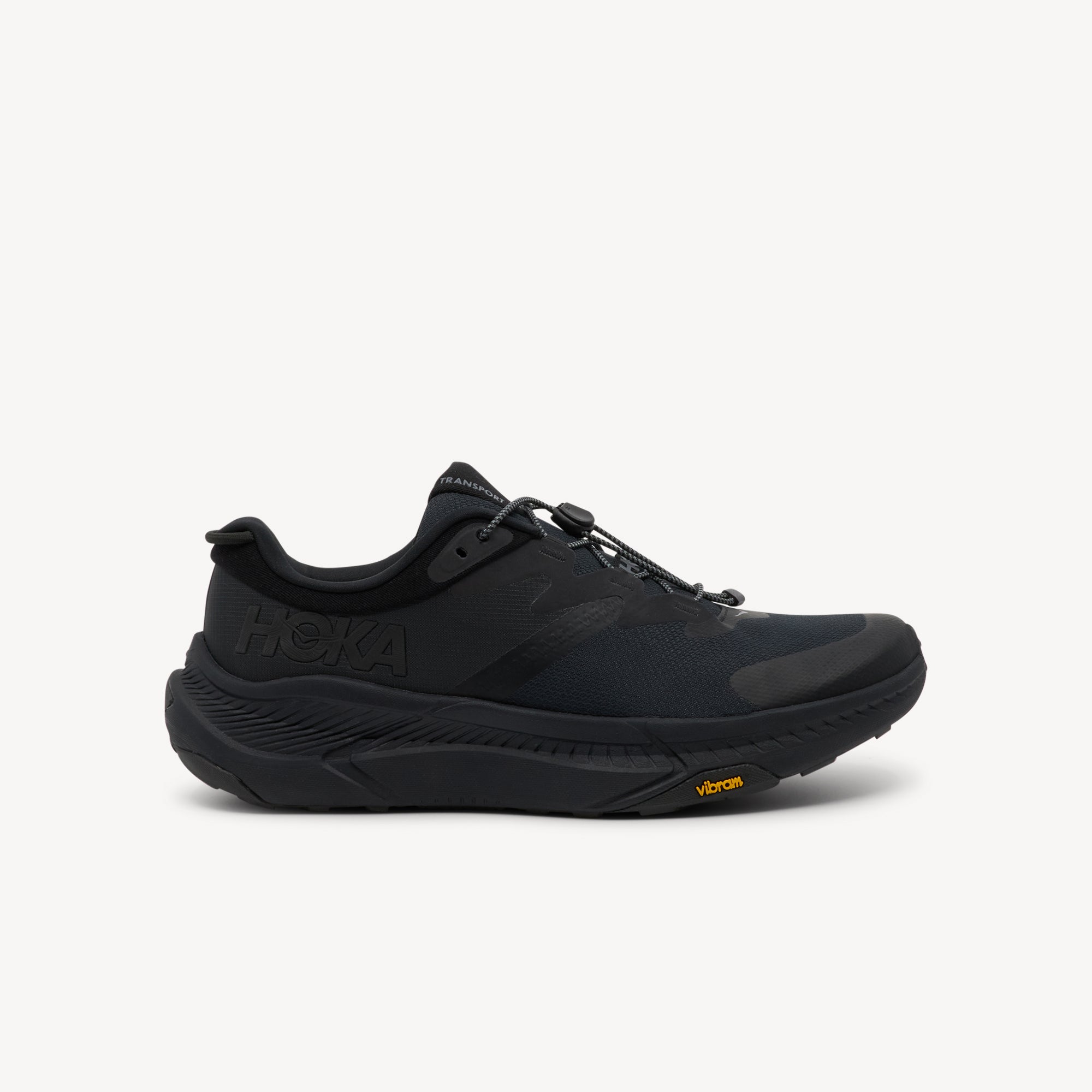 Hoka Transport features recovery comfort at Profeet Footwear. Plush cushioned slide with extended heel geometry for relaxed wear. Shop now.