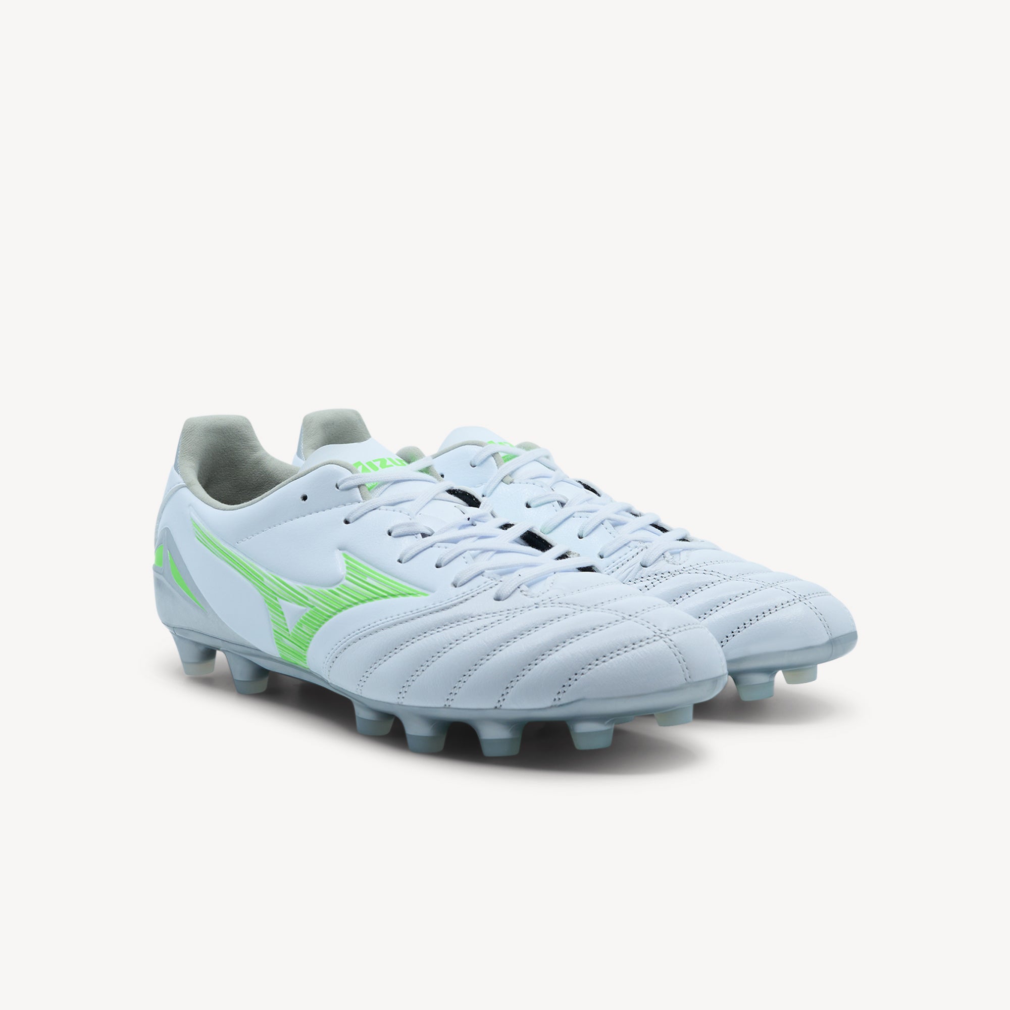 Side view of Mizuno Morelia Neo IV Pro FG features lightweight design at Profeet Footwear. Men's football boot for firm ground with exceptional touch and comfort.
