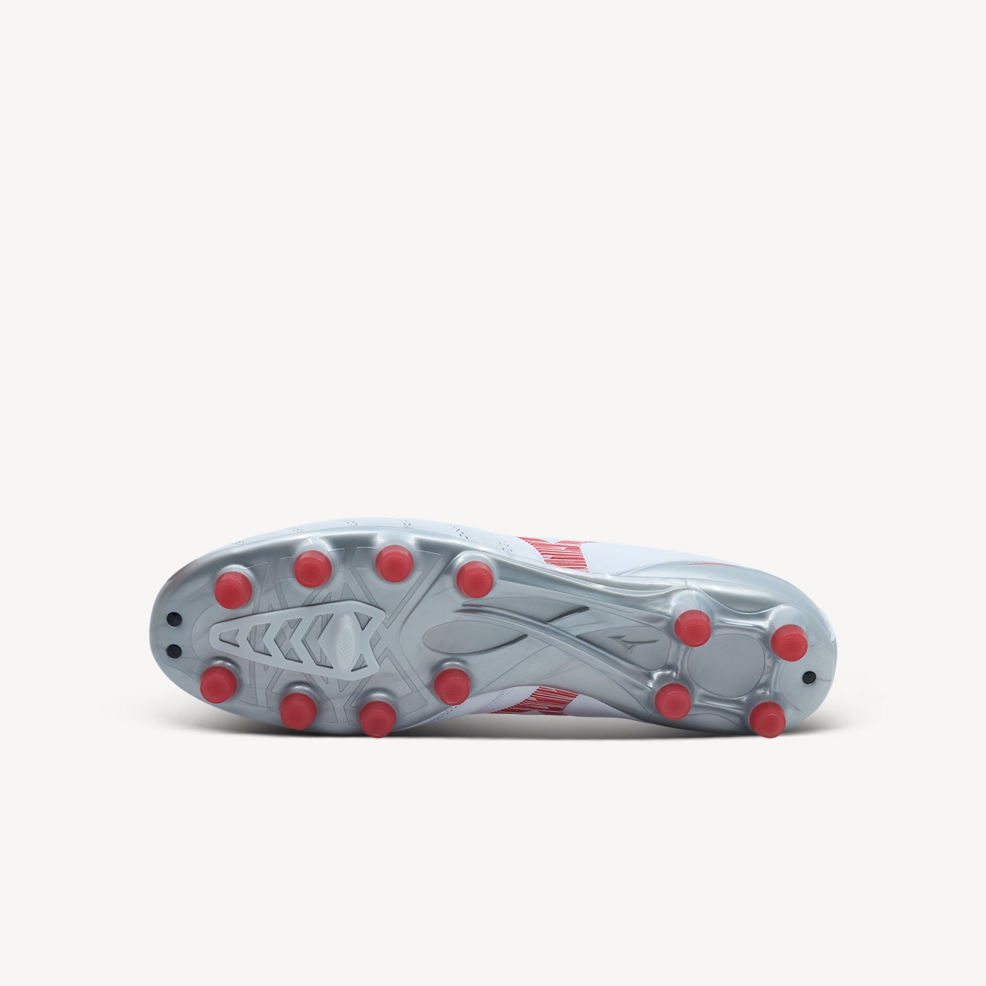 Outsole view of Mizuno Morelia. Iconic Styling combines luxurious upper with timeless Mizuno aesthetic creating boot that oozes class both on and off pitch.