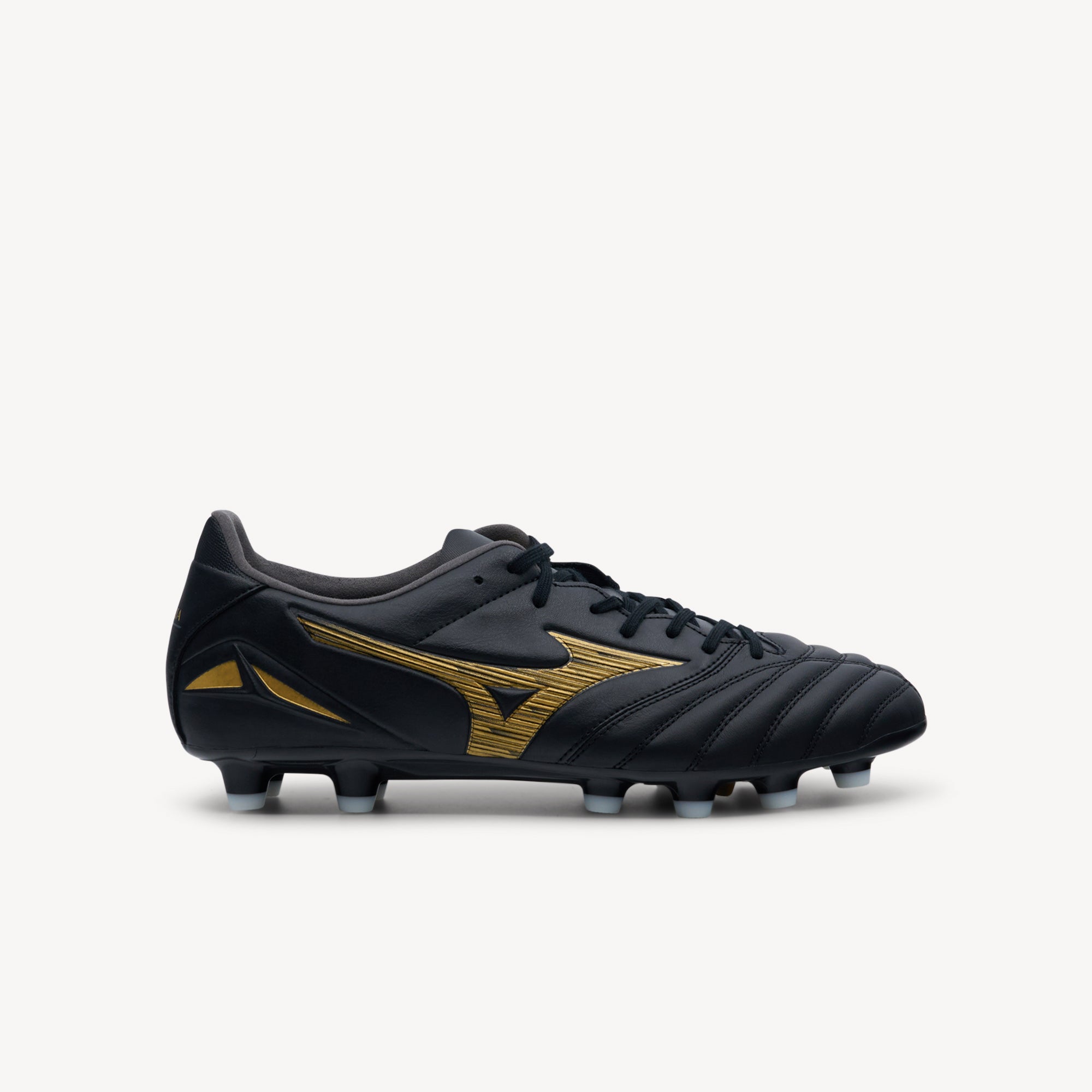Mizuno Morelia Neo IV Pro features legendary touch at Profeet Footwear. Aurum Pack firm ground boot with K-leather forefoot for ultimate ball control.