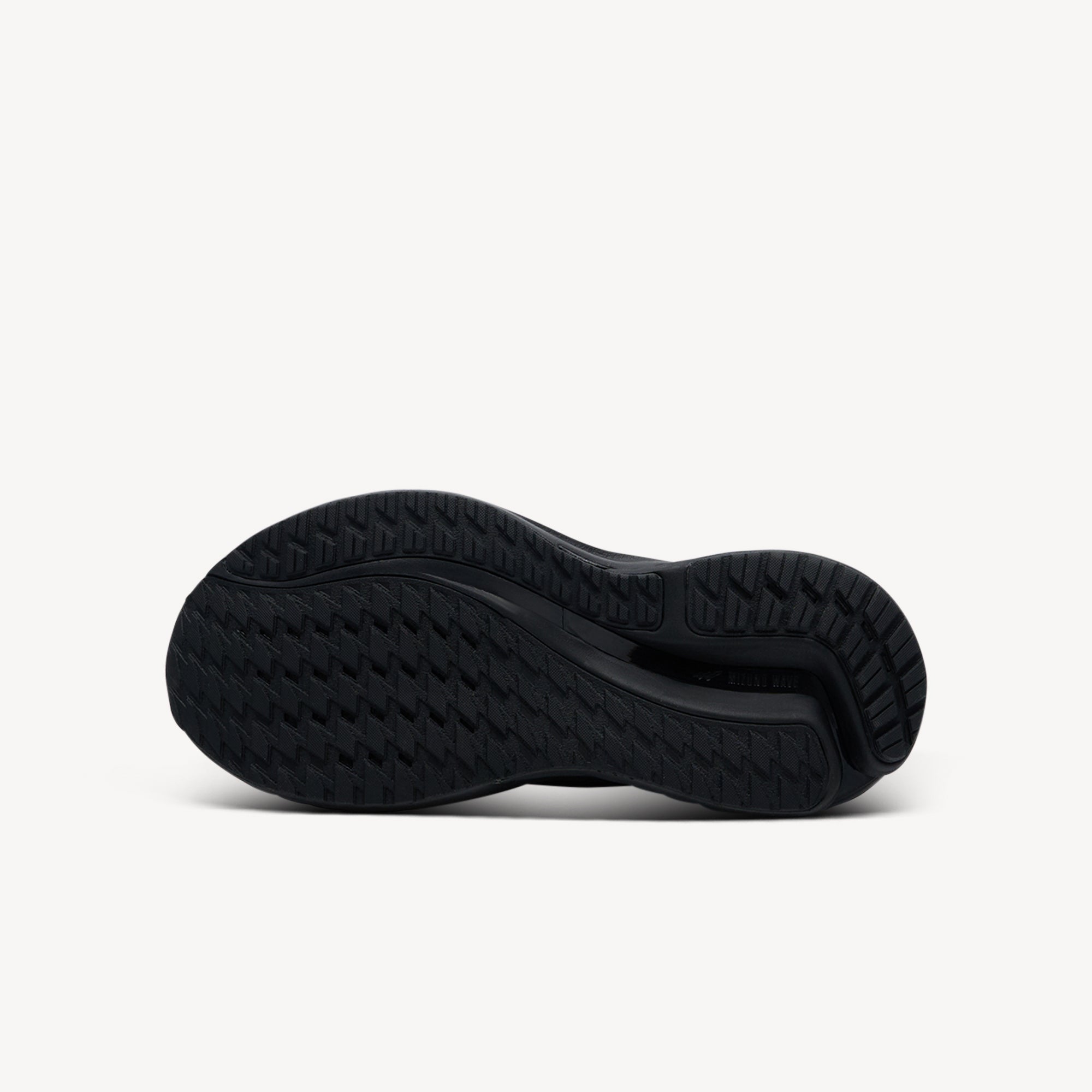 Outsole view of Mizuno Wave Inspire 21 features anatomical Wave plate at Profeet Footwear. Women's stability shoe for overpronators seeking comfort and support.