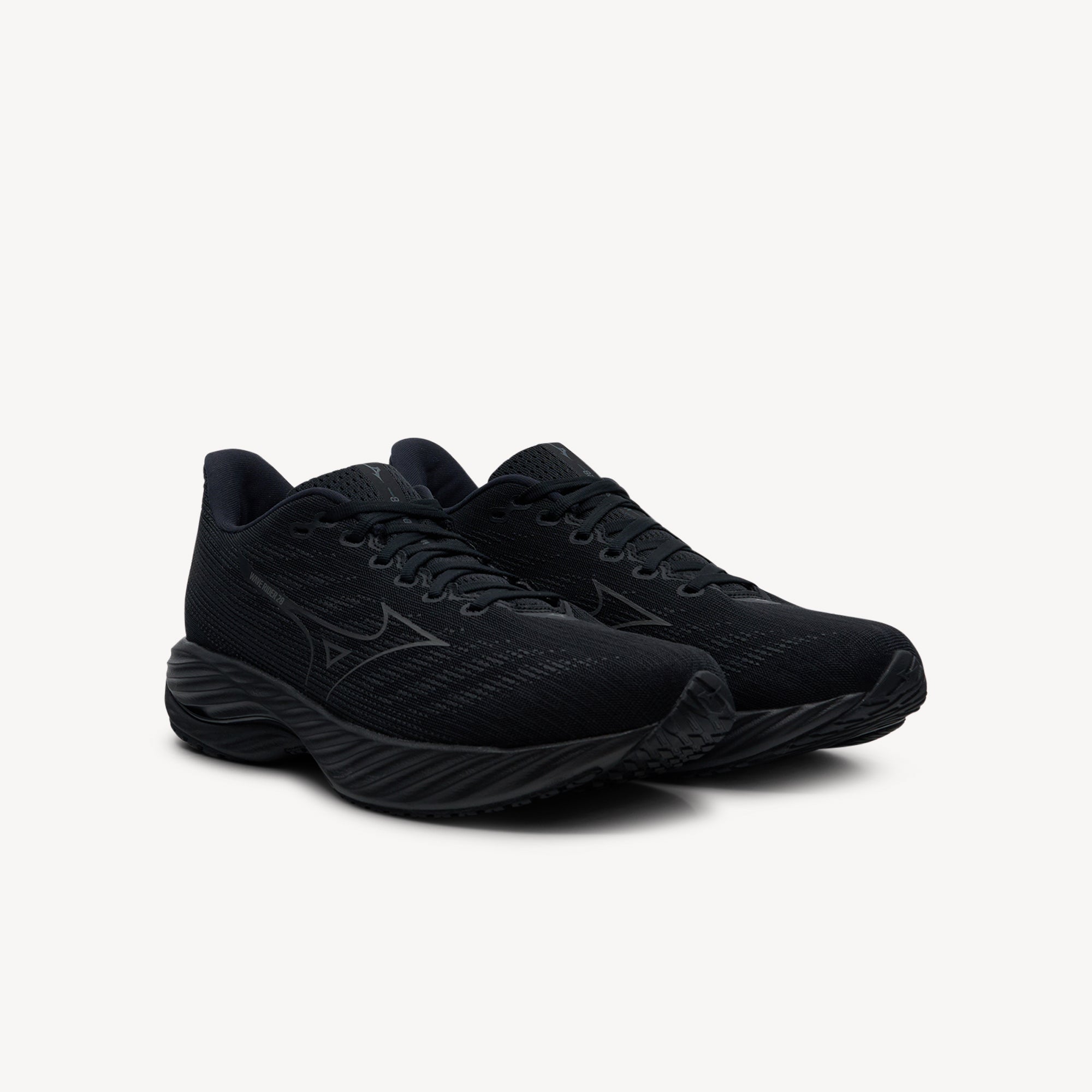 Side view of Mizuno Wave Rider 28 features bio-based Wave Plate at Profeet Footwear. Men's neutral running shoe for smooth transitions and responsive daily training runs.