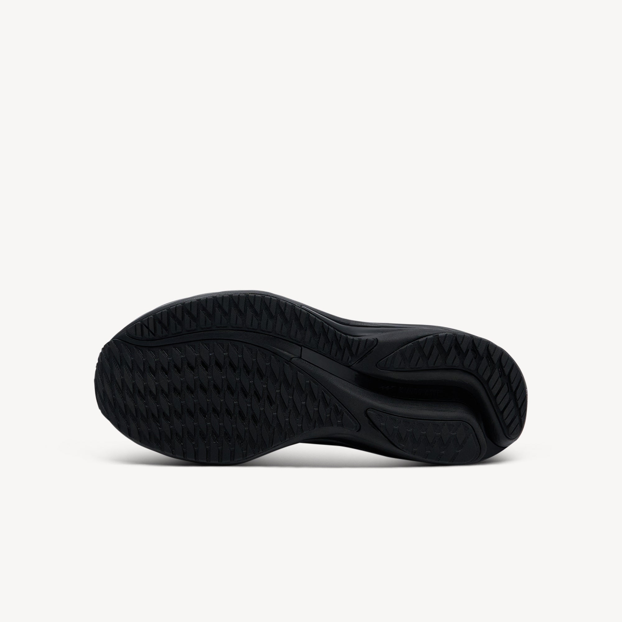 Outsole view of Mizuno Wave Rider 28 features bio-based Wave Plate at Profeet Footwear. Men's neutral running shoe for smooth transitions and responsive daily training runs.