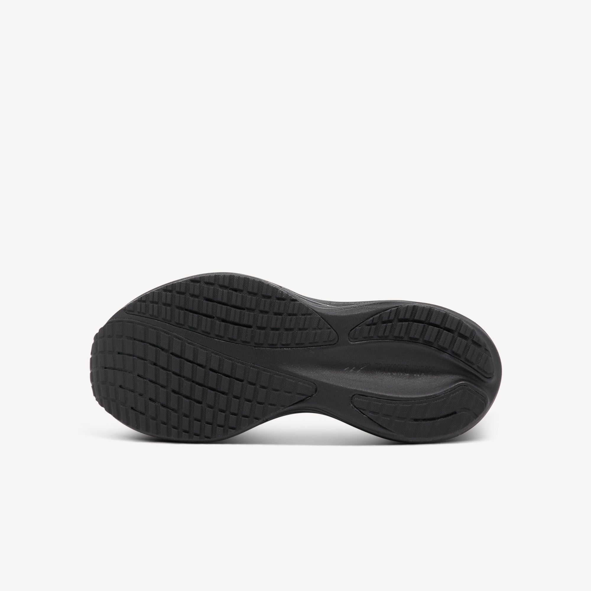 Outsole view of Mizuno Wave Rider 29. X10 carbon rubber outsole with strategic placement in high-wear areas and flex grooves in forefoot for extended durability and smooth transitions. Shop now at Profeet Footwear.