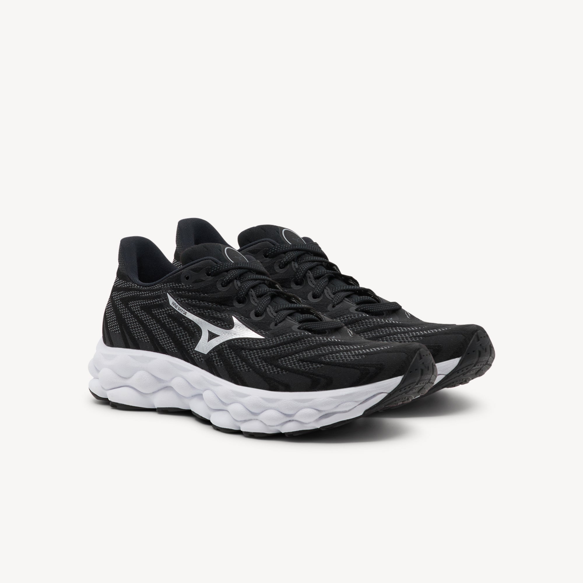Side view of Mizuno Wave Sky 8 features Foam Wave technology at Profeet Footwear. Women's cushioned trainer for floating comfort and responsive daily running.