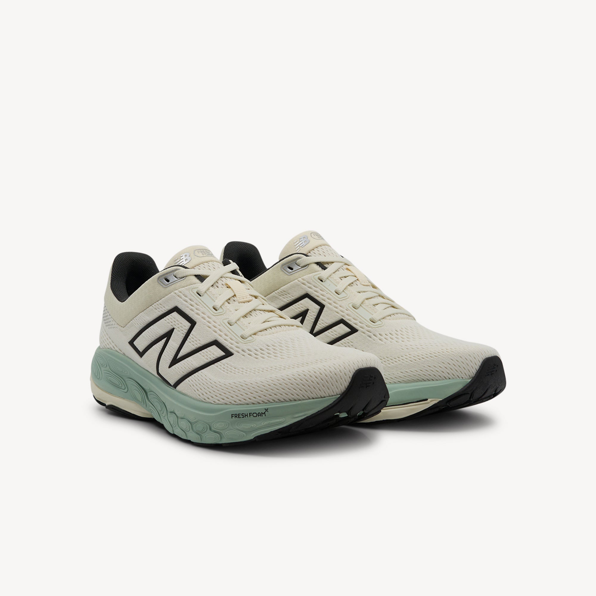 Side view of New Balance Fresh Foam X 860v14 Sea Salt Womens delivers premium cushioning and smooth stability with Stability Plane tech and an 8 mm drop. Shop now.