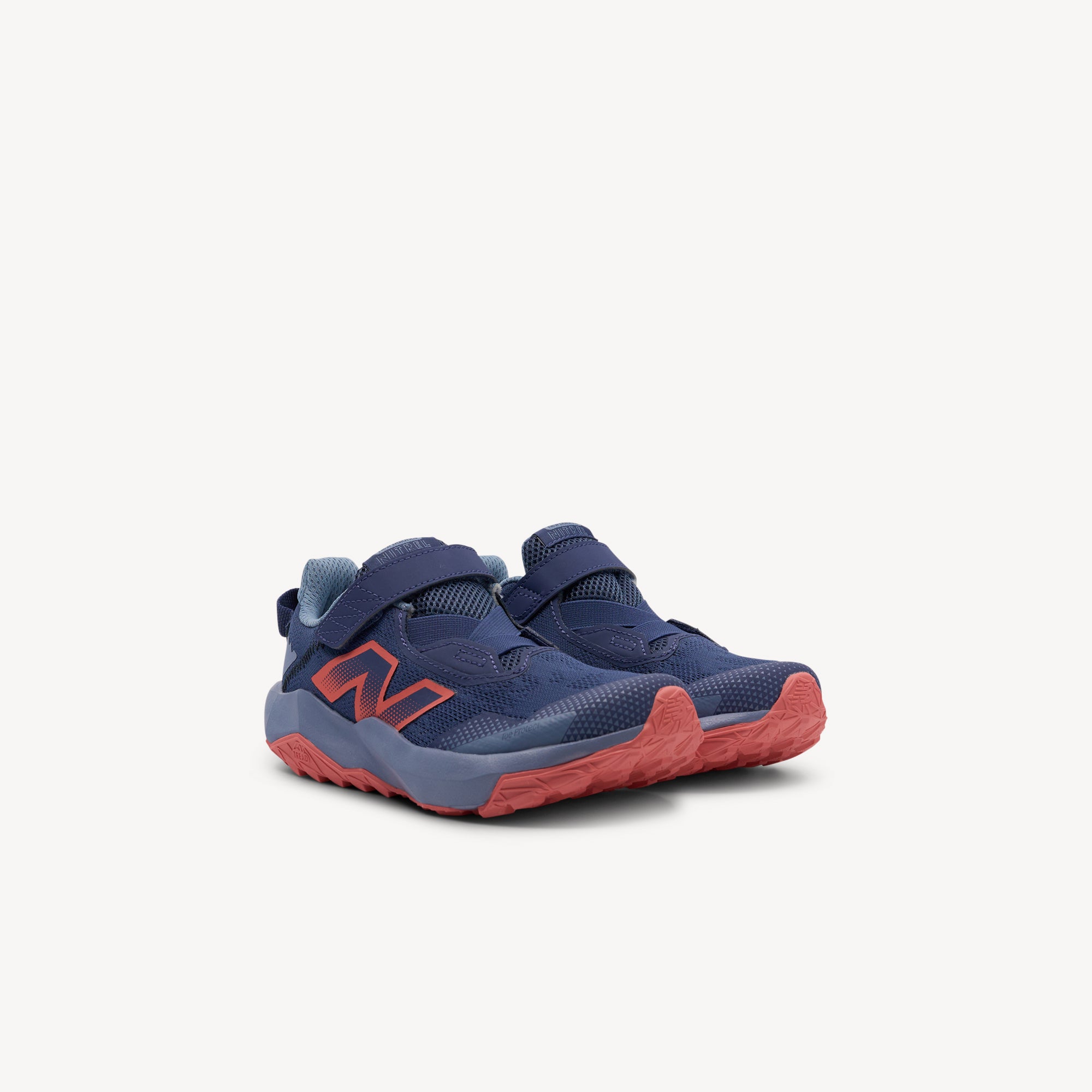Side view of New Balance Nitrel v6 Dream State PS Kids features plush DynaSoft cushioning and versatile AT Tread traction for energetic kids. Shop now at Profeet Footwear.