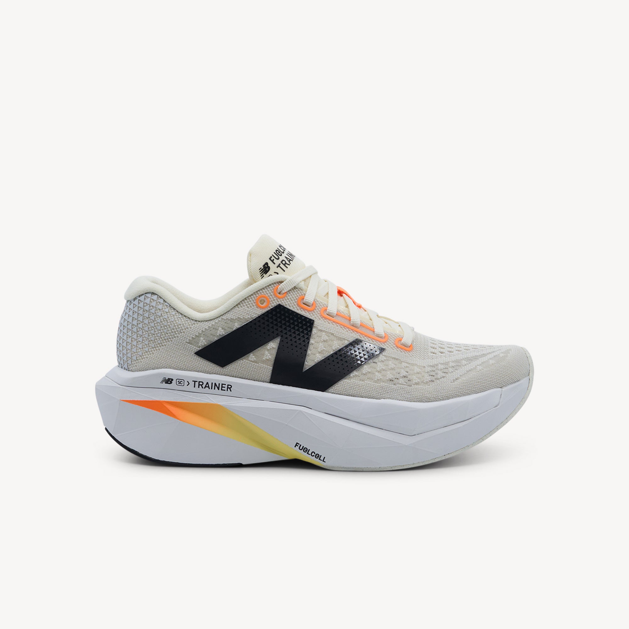 New Balance FuelCell SuperComp Trainer v3 Angora Womens features responsive FuelCell midsole, Energy Arc carbon plate and plush mesh upper for premium running performance.