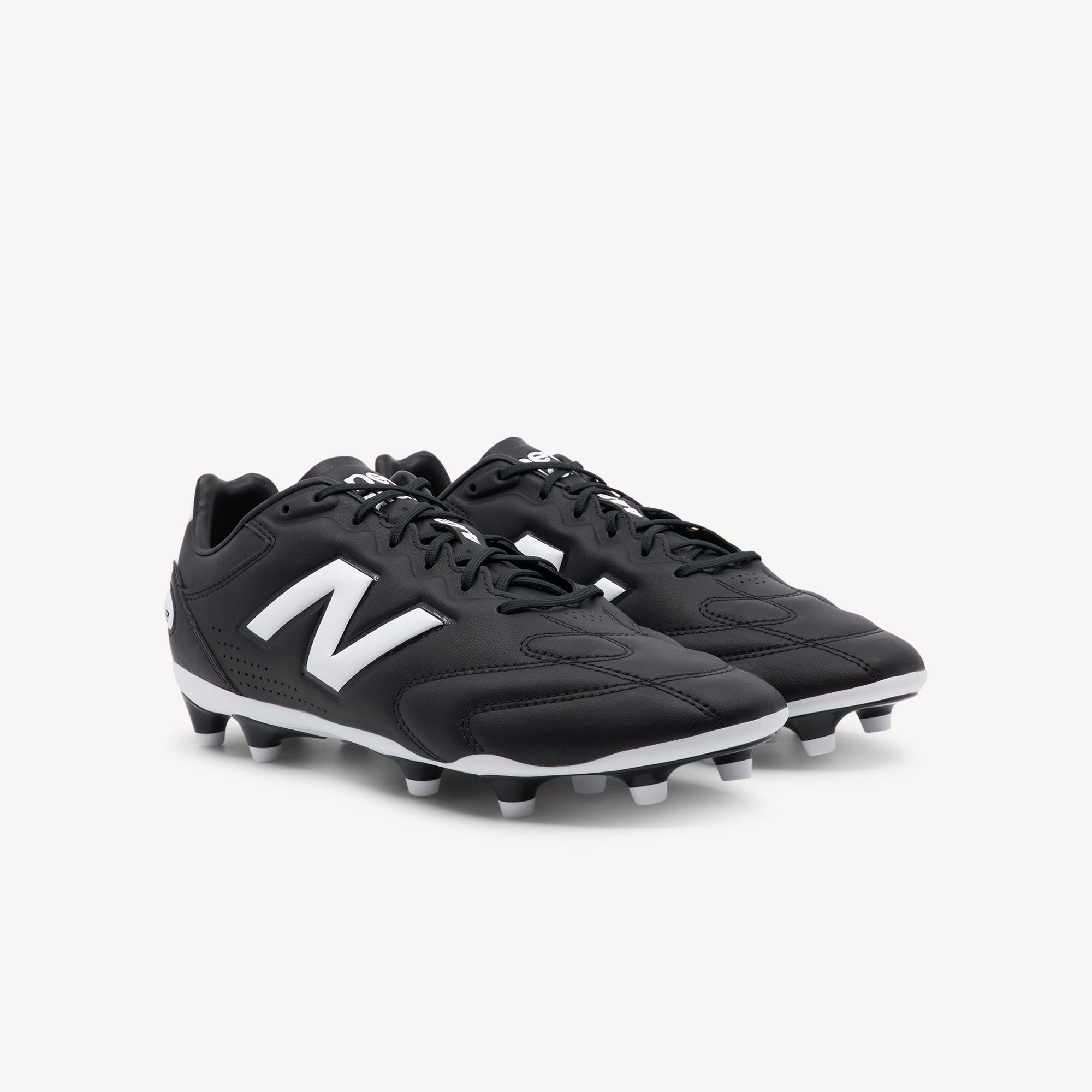Side view of NEW BALANCE 442 PRO V3 FG features elite control and precision at Profeet Footwear. Purpose-built football boot for men. Expert-fitted.