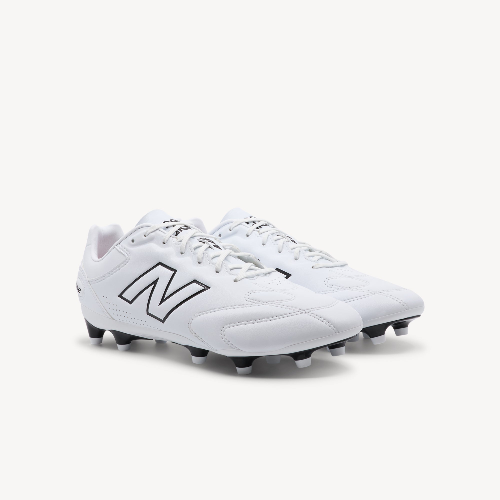 Side view of NEW BALANCE 442 PRO V3 FG features elite control and precision at Profeet Footwear. Purpose-built football boot for men. Expert-fitted.