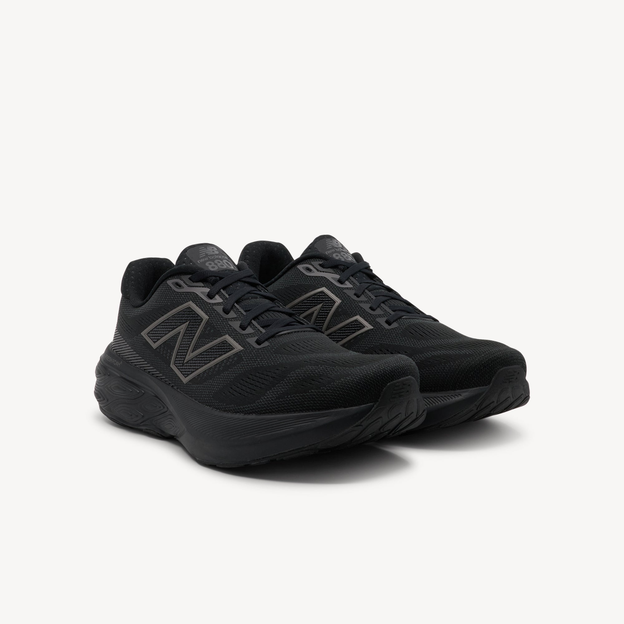 Side view of New Balance Fresh Foam X 880v15 Triple Black Mens features premium Fresh Foam X cushioning, 6 mm drop and breathable engineered mesh for all‑day comfort. Shop now.
