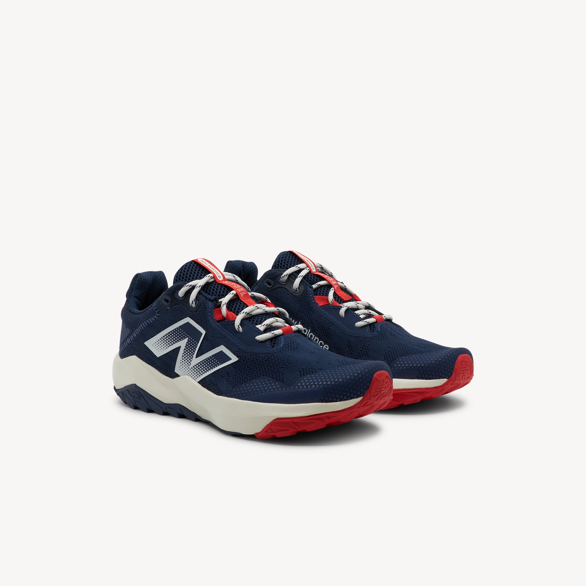 Side view of New Balance Nitrel v6 GS Kids Navy/Sea Salt features plush DynaSoft midsole, durable AT Tread traction for mixed surfaces and no‑sew overlays for active young feet.