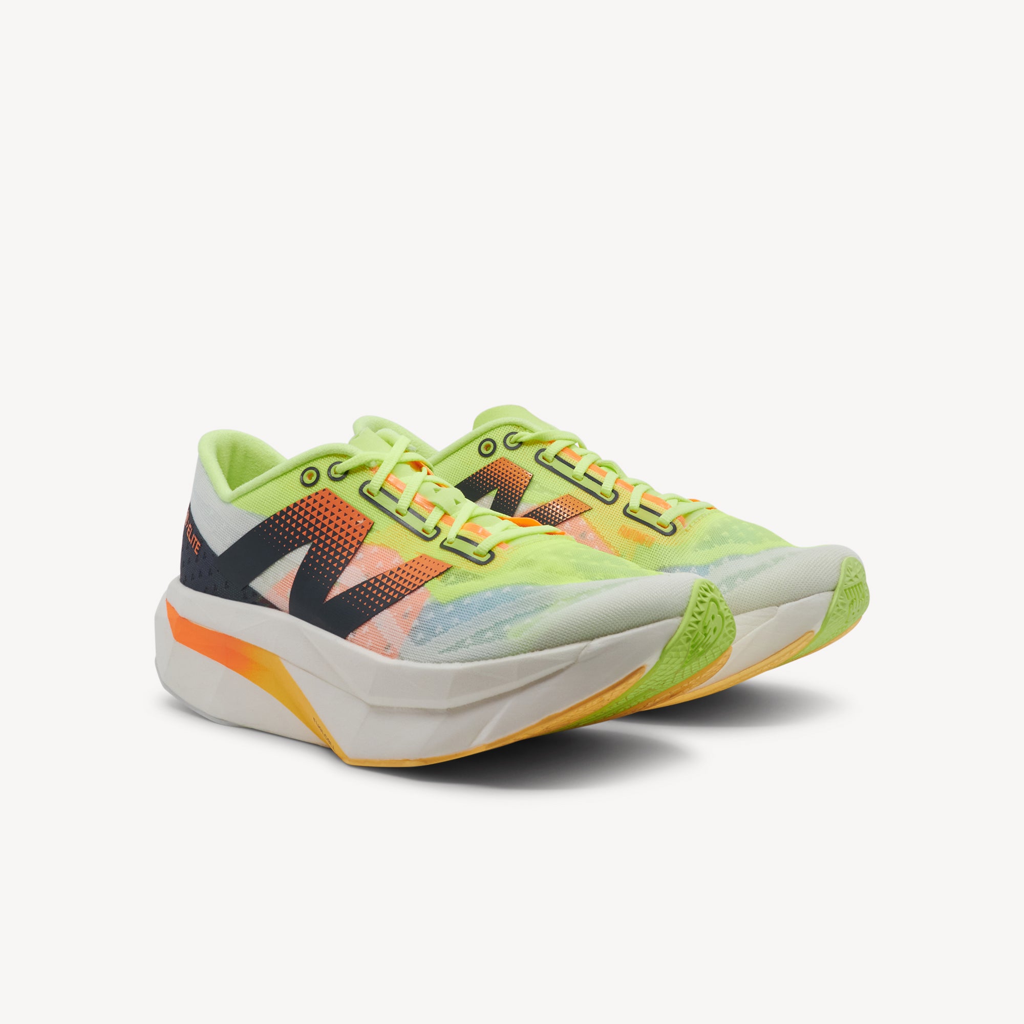 Side view of New Balance FuelCell SuperComp Elite v4 White Bleached Lime Glo Hot Mango Womens features ultra‑light FuelCell PEBA midsole, full carbon plate and rockered geometry for fast runs.