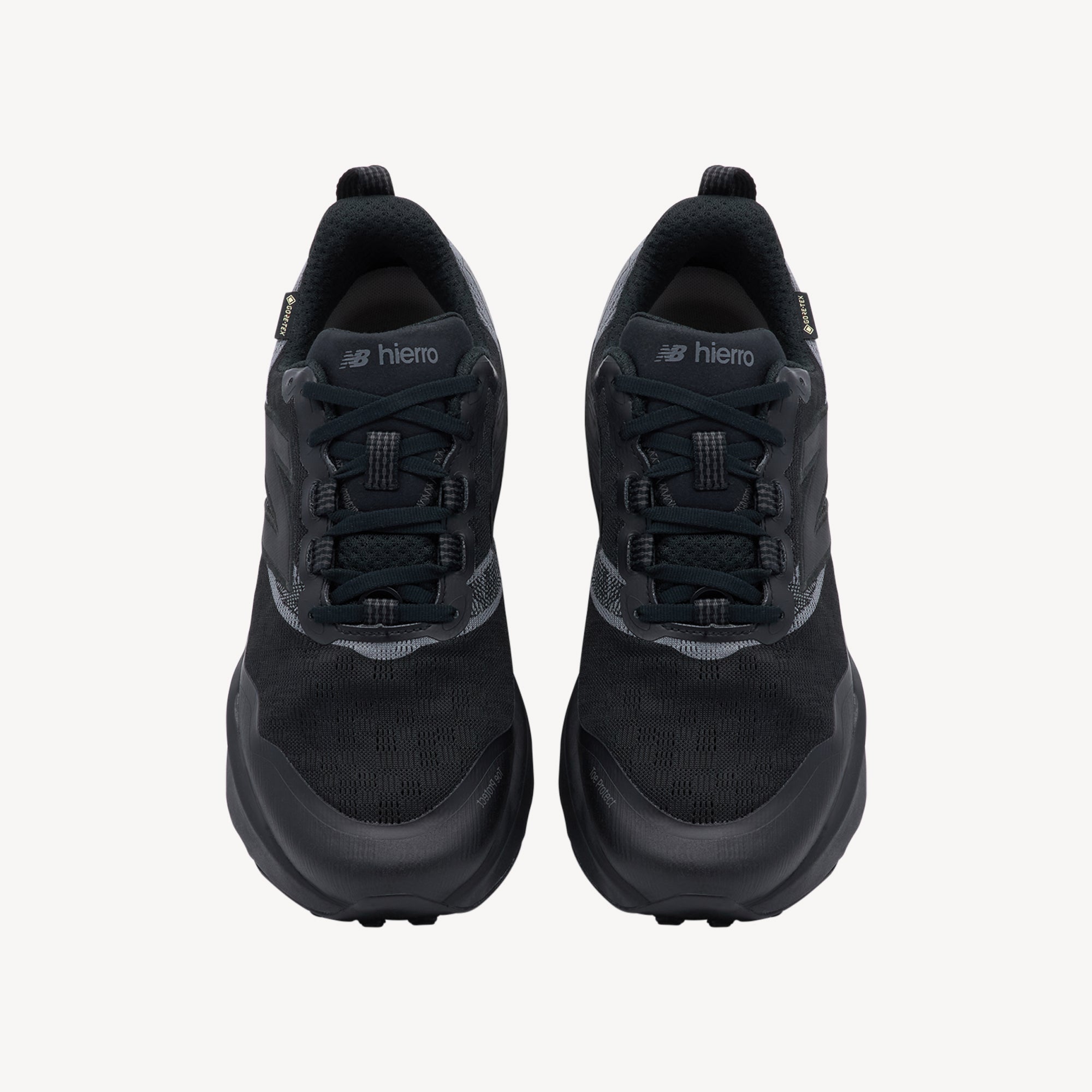 Side view of New Balance Hierro v9 men's showcasing 42mm heel stack height and dual-density Fresh Foam X midsole technology for trail running comfort
