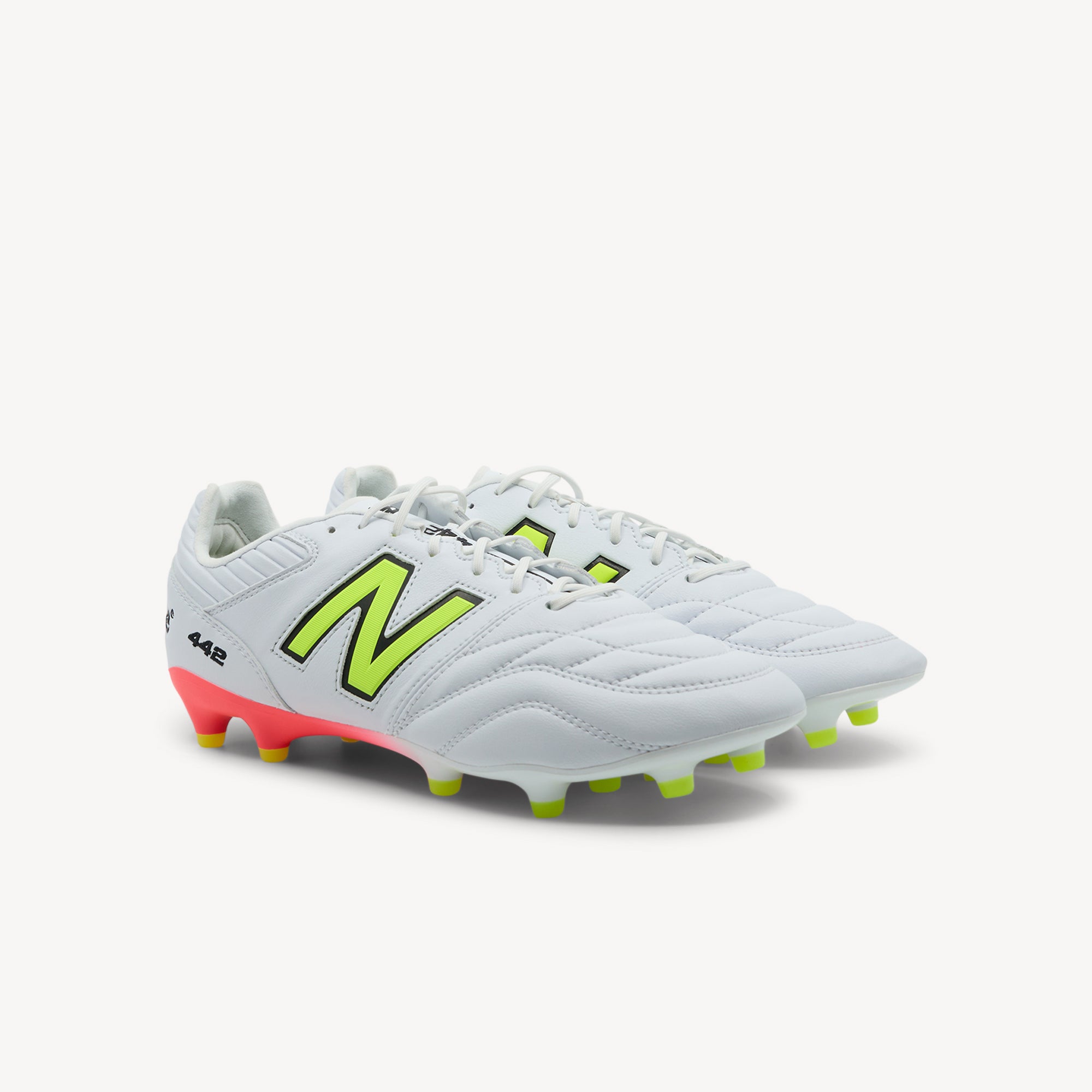 side view of New Balance 442 Team FG V2 features quality construction and value pricing at Profeet Footwear. Dependable football boot for grassroots players. Shop now.