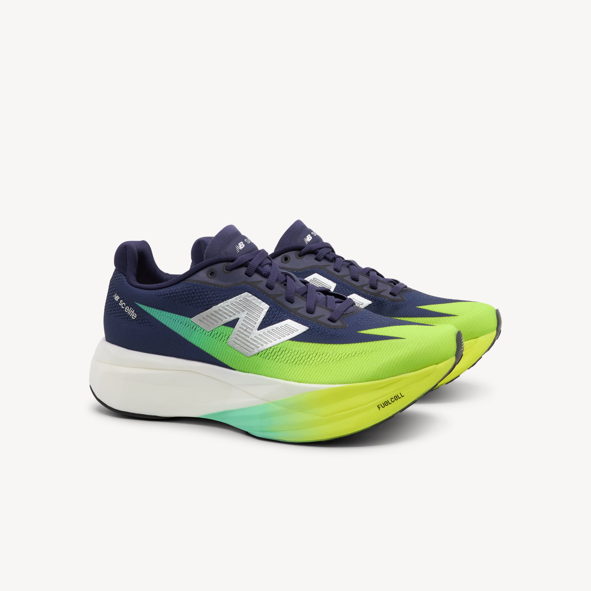 Side view of NEW BALANCE SUPERCOMP ELITE V5 features explosive speed and maximum energy return at Profeet Footwear. Purpose-built racing shoe. Expert-fitted.