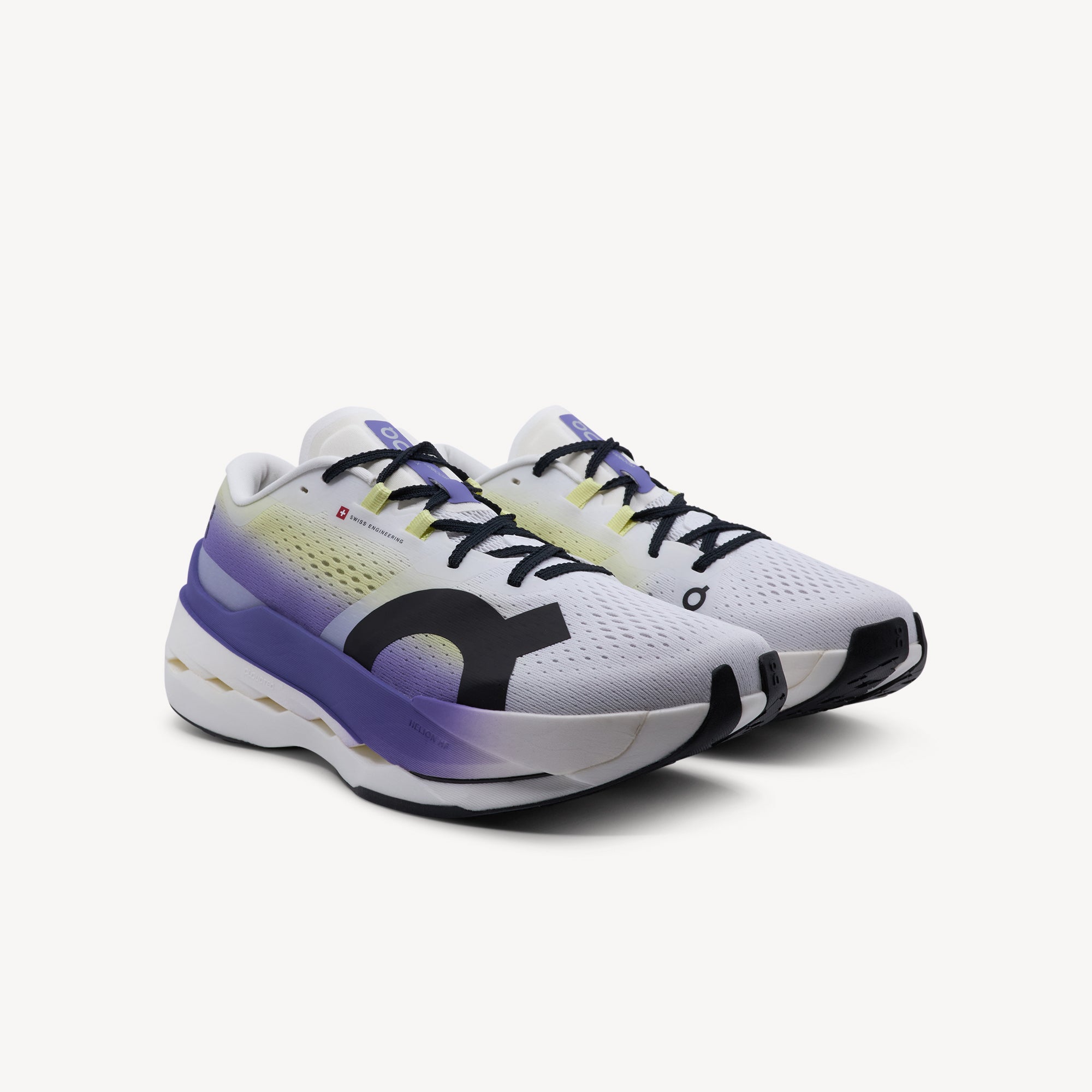 Side view of ON CLOUDBOOM MAX features explosive energy return and elite performance at Profeet Footwear. Purpose-built racing shoe for men. Expert-fitted.