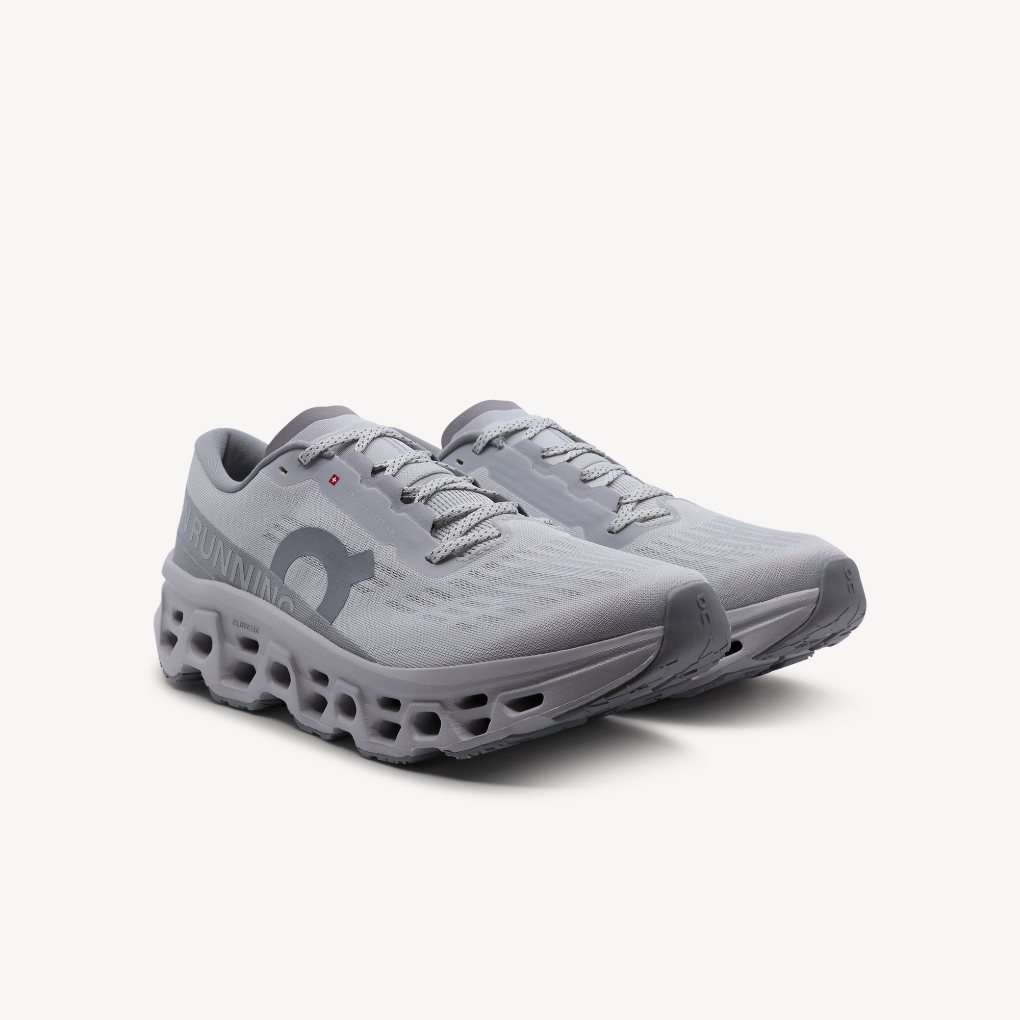 Side view of ON CLOUDMONSTER 3 features playful responsive ride and versatile performance at Profeet Footwear. Purpose-built running shoe. Expert-fitted.