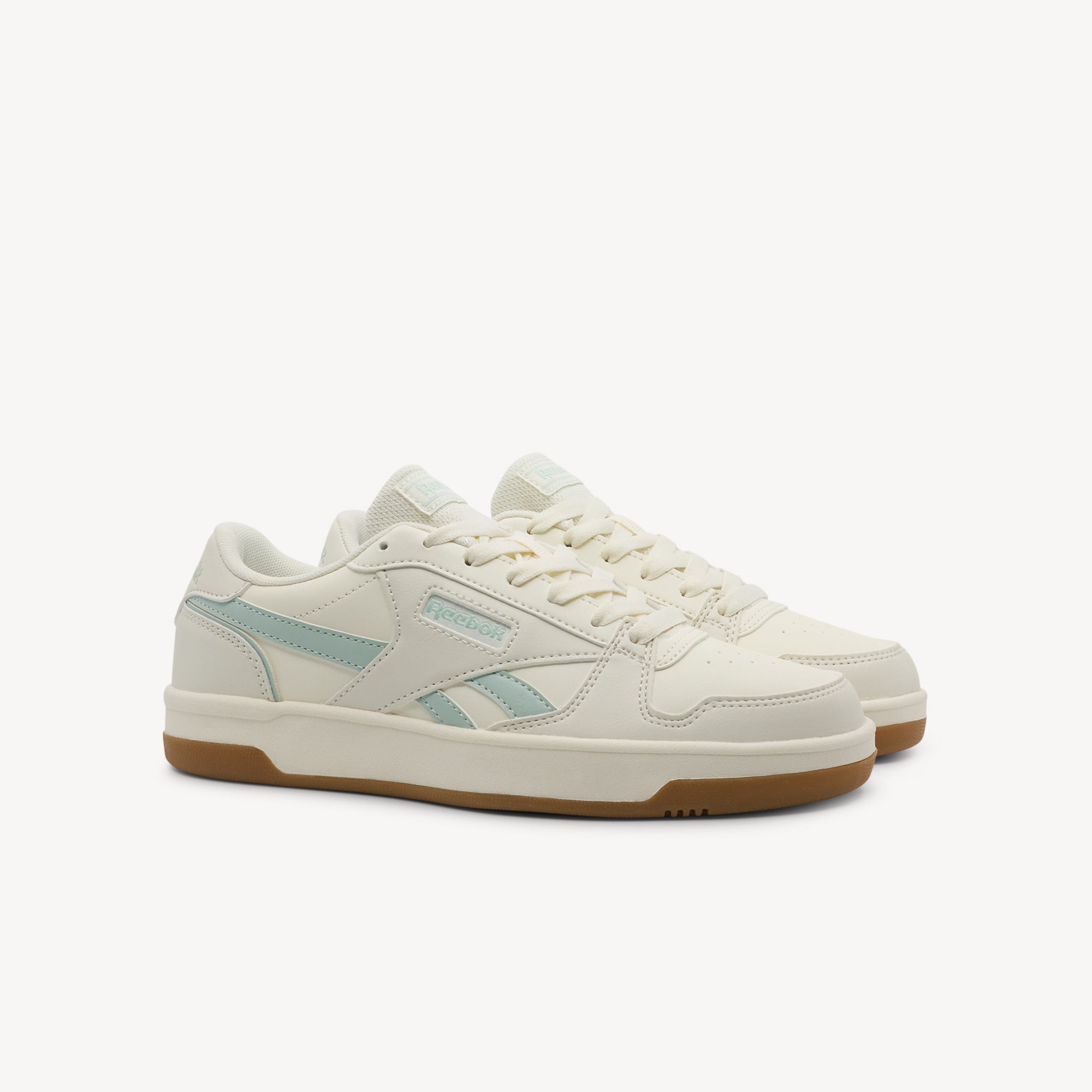 Side view of REEBOK MATCH PRIME V2 features stylish design and versatile performance at Profeet Footwear. Purpose-built court shoe for women. Expert-fitted.