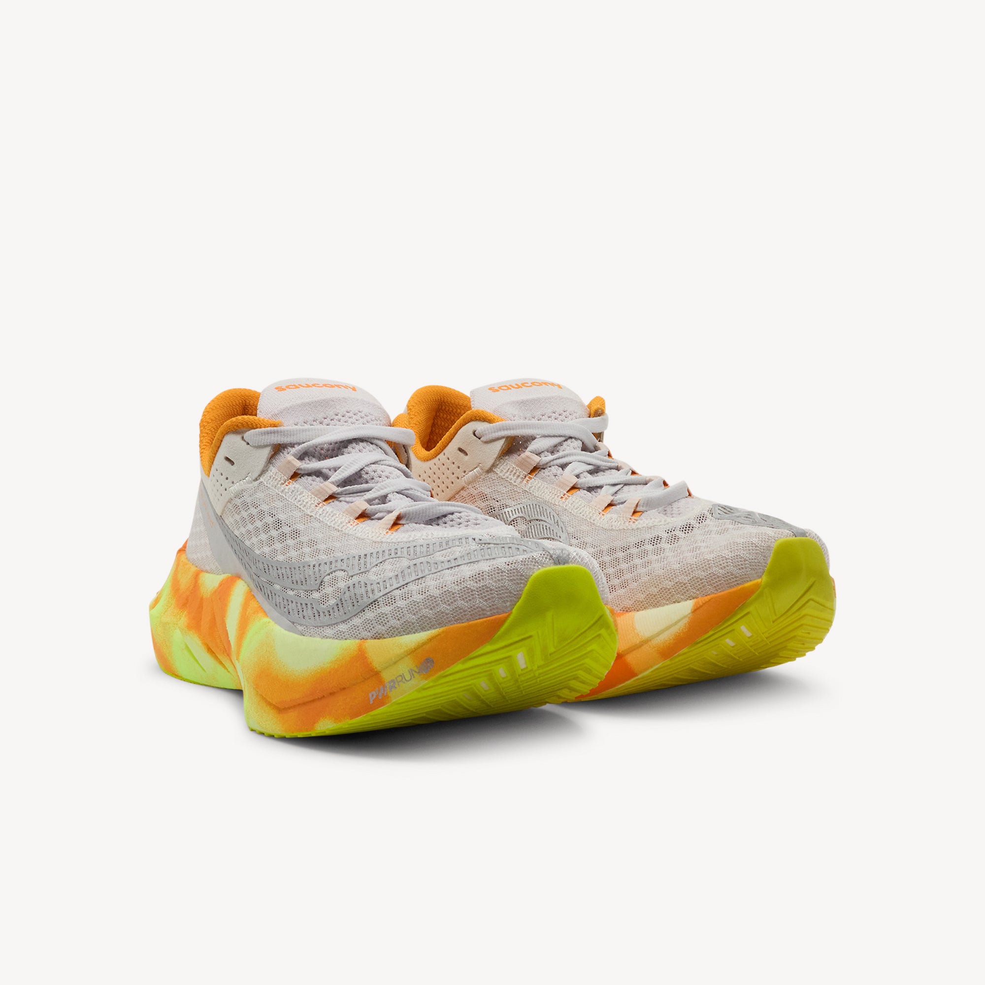 Side view of SAUCONY ENDORPHIN PRO 4 features effortless speed and propulsive forward motion at Profeet Footwear. Elite carbon-plated racing shoe for women. Expert-fitted.