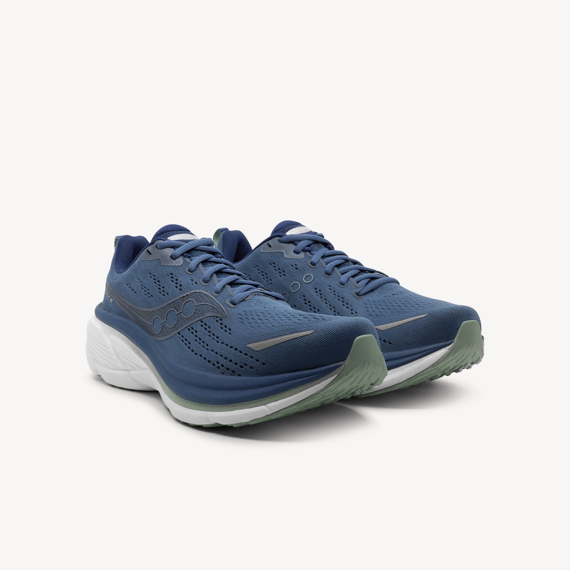 Side view of SAUCONY HURRICANE 25 features plush cushioning and reliable stability at Profeet Footwear. Purpose-built running shoe for men. Expert-fitted.