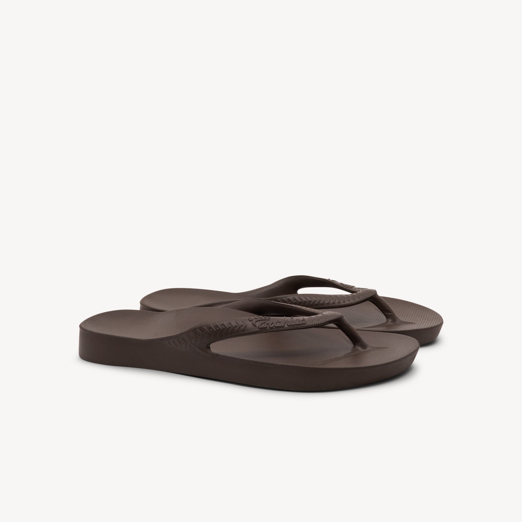 Side view of Archies Thongs Brown features 2.2cm arch support at Profeet Footwear. Single-mould design for durability and all-day comfort. Shop now.