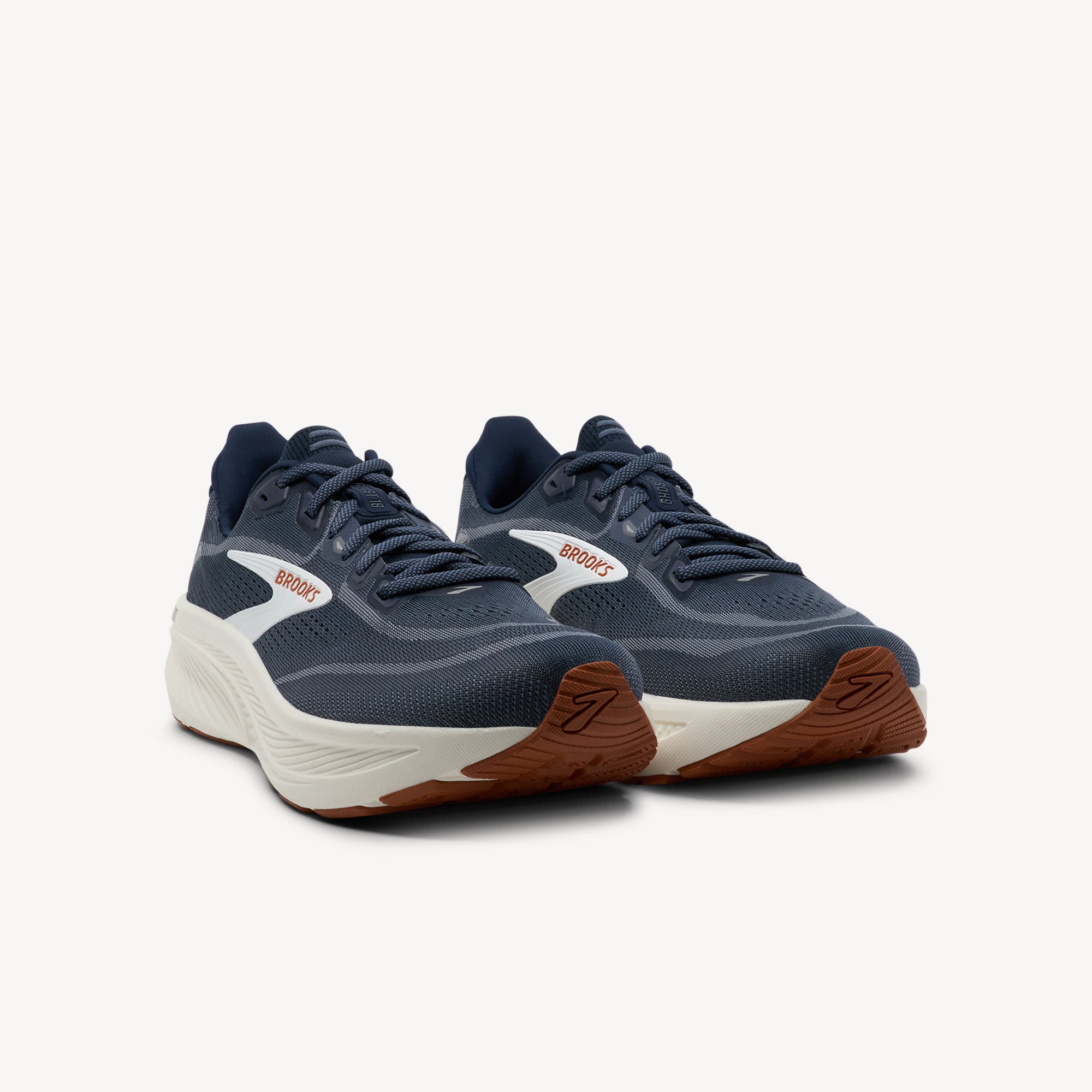 Side view of BROOKS GHOST 18 features soft smooth balanced cushioning and optimal comfort at Profeet Footwear. Daily training shoe for men. Expert-fitted.