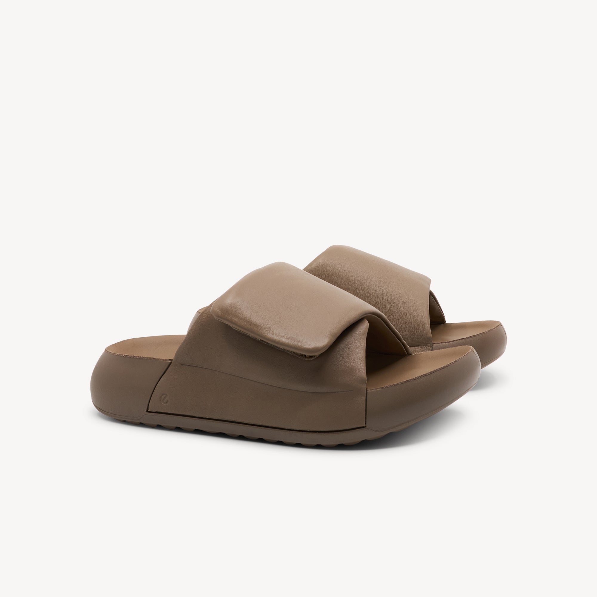 Side view of Ecco Cozmo PF Slide features timeless platform design at Profeet Footwear. Premium leather slide sandal with anatomical footbed for relaxation. Shop now.