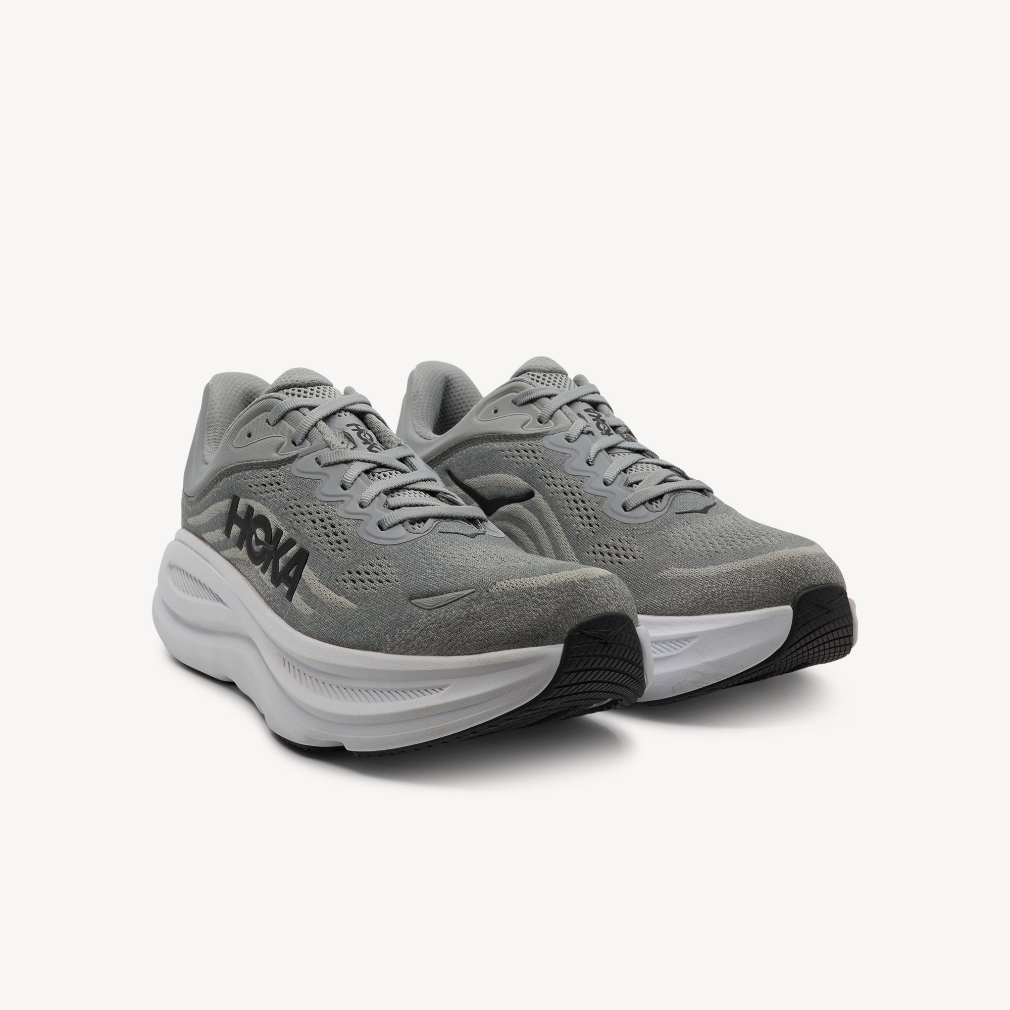 Side view of HOKA BONDI 9 features ultimate plush cushioning and smooth comfort at Profeet Footwear. Purpose-built running shoe for men. Expert-fitted.