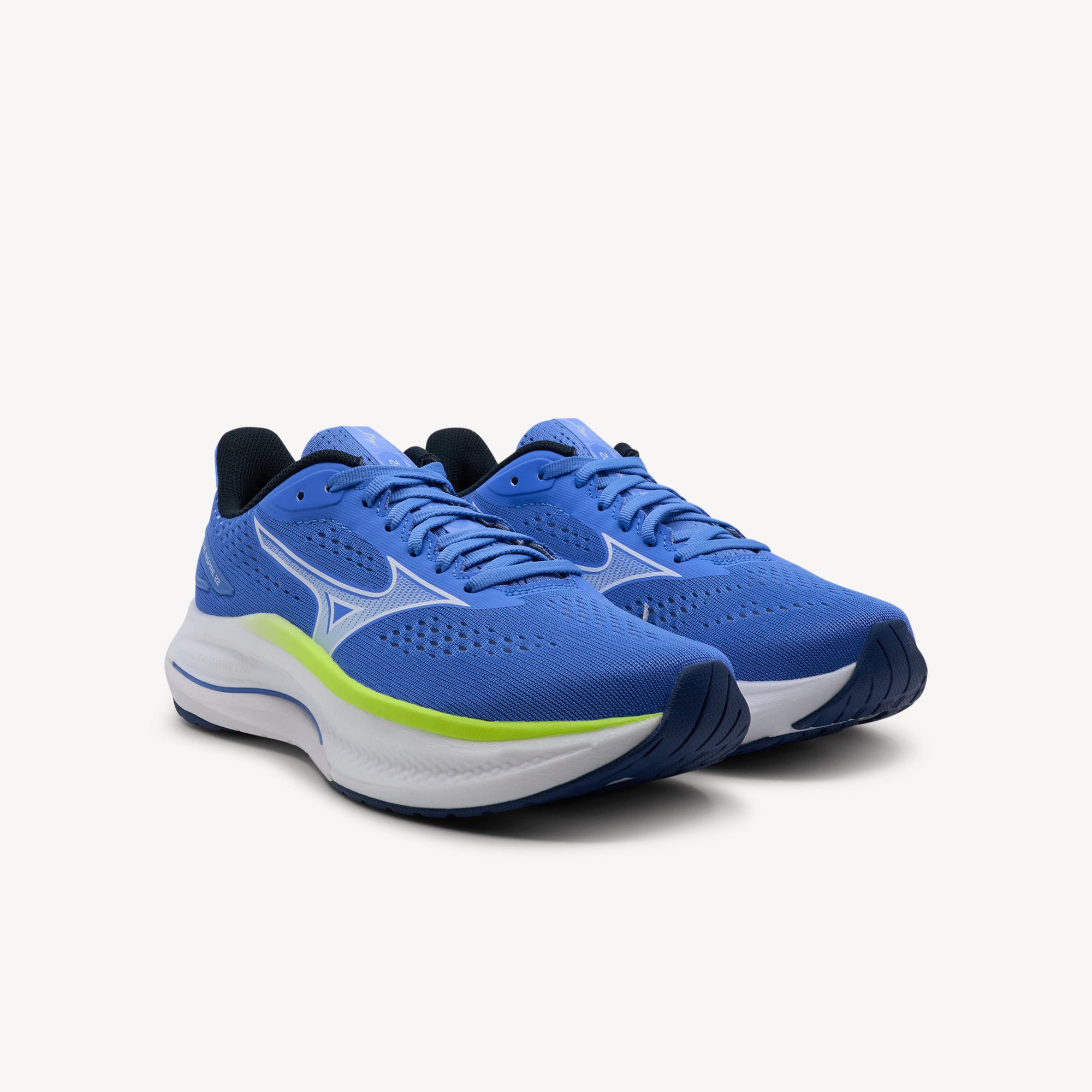 Side view of MIZUNO WAVE INSPIRE 22 features reliable stability support and responsive comfort at Profeet Footwear. Purpose-built running shoe. Expert-fitted.