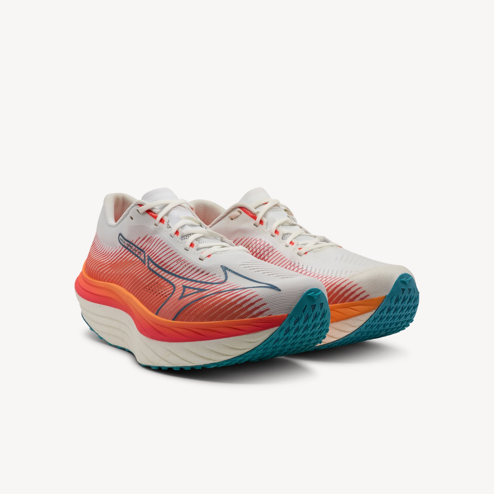 Side view of MIZUNO WAVE REBELLION PRO features explosive propulsion and responsive performance at Profeet Footwear. Elite-level racing shoe for men. Expert-fitted.