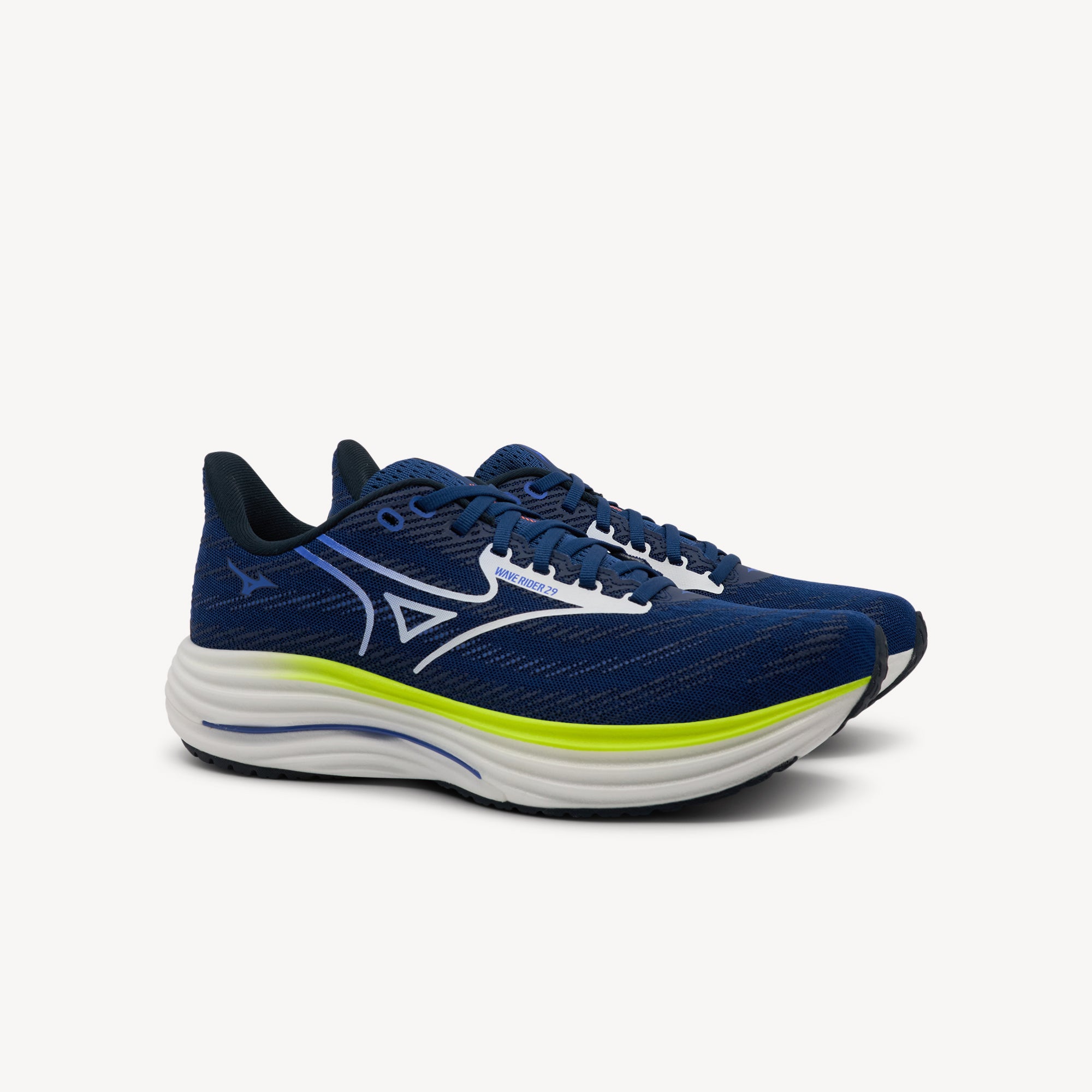 Side view of MIZUNO WAVE RIDER 29 features smooth cushioning and responsive performance at Profeet Footwear. Purpose-built running shoe for men. Expert-fitted.