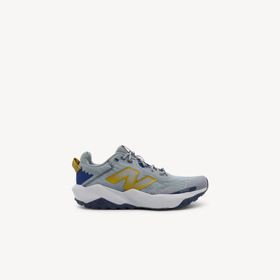 New Balance Nitrel v6 kids' shoes feature DynaSoft midsole & AT Tread outsole at Profeet Footwear. Versatile performance for trails, sports & daily adventures.