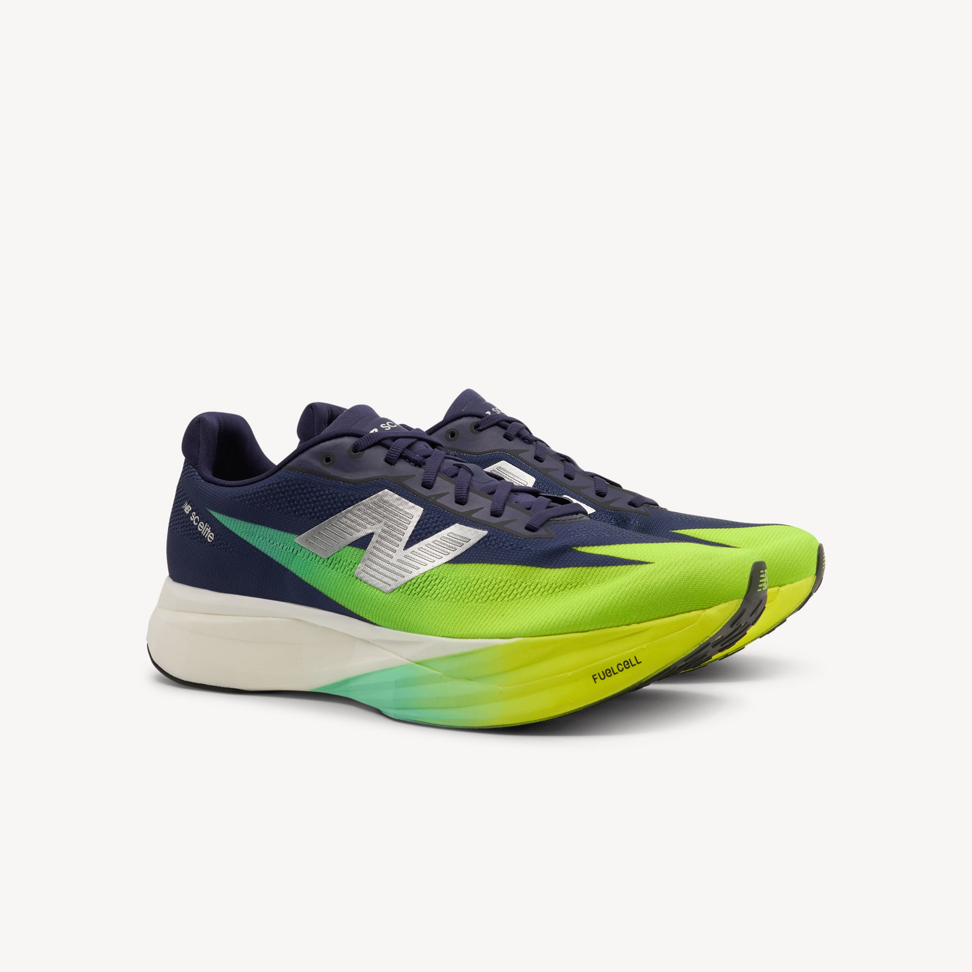 Side view of NEW BALANCE SUPERCOMP ELITE V5 features explosive speed and maximum energy return at Profeet Footwear. Purpose-built racing shoe. Expert-fitted.